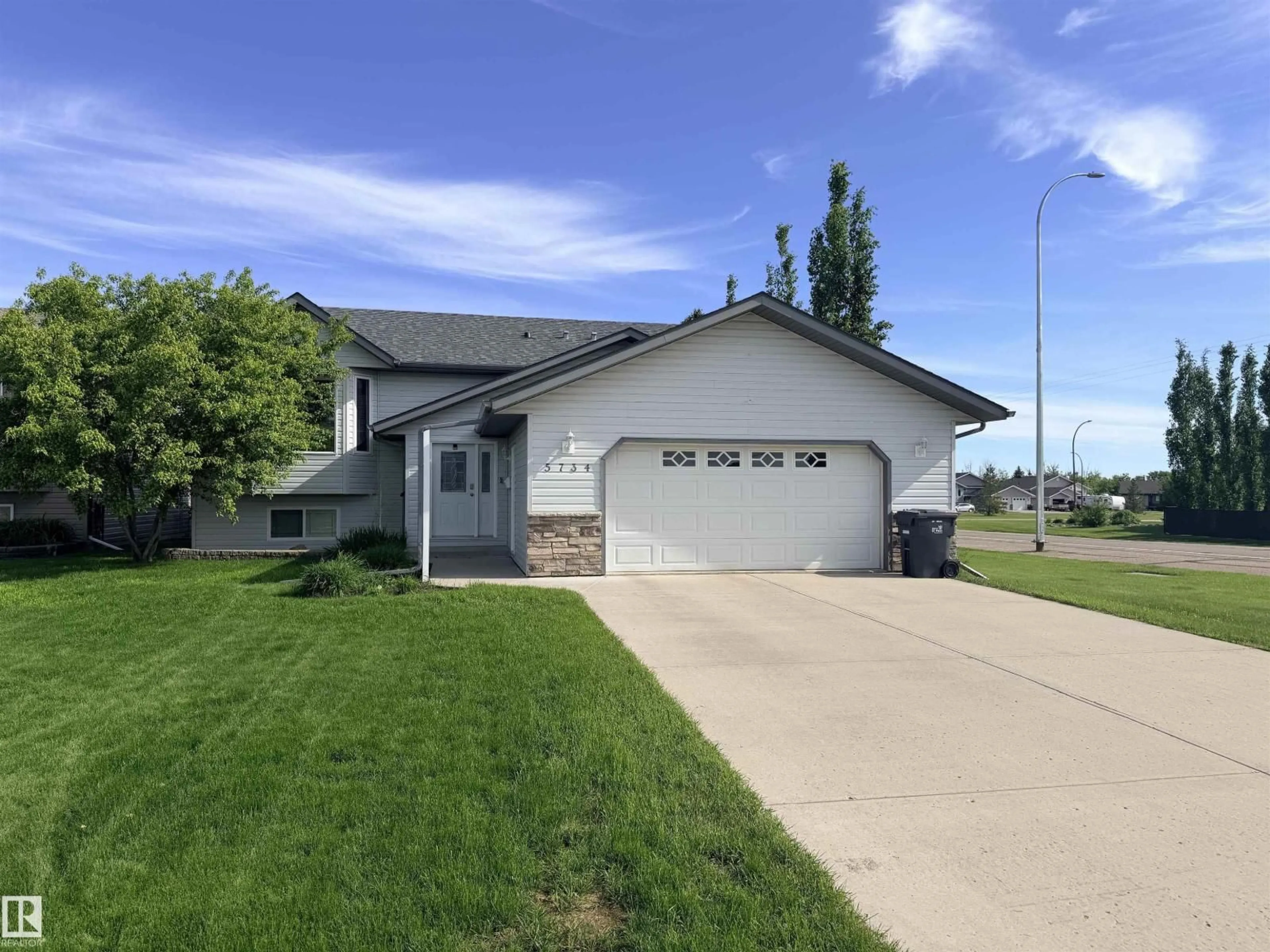 Home with vinyl exterior material, street for 5734 47 AV, St. Paul Town Alberta T0A3A1