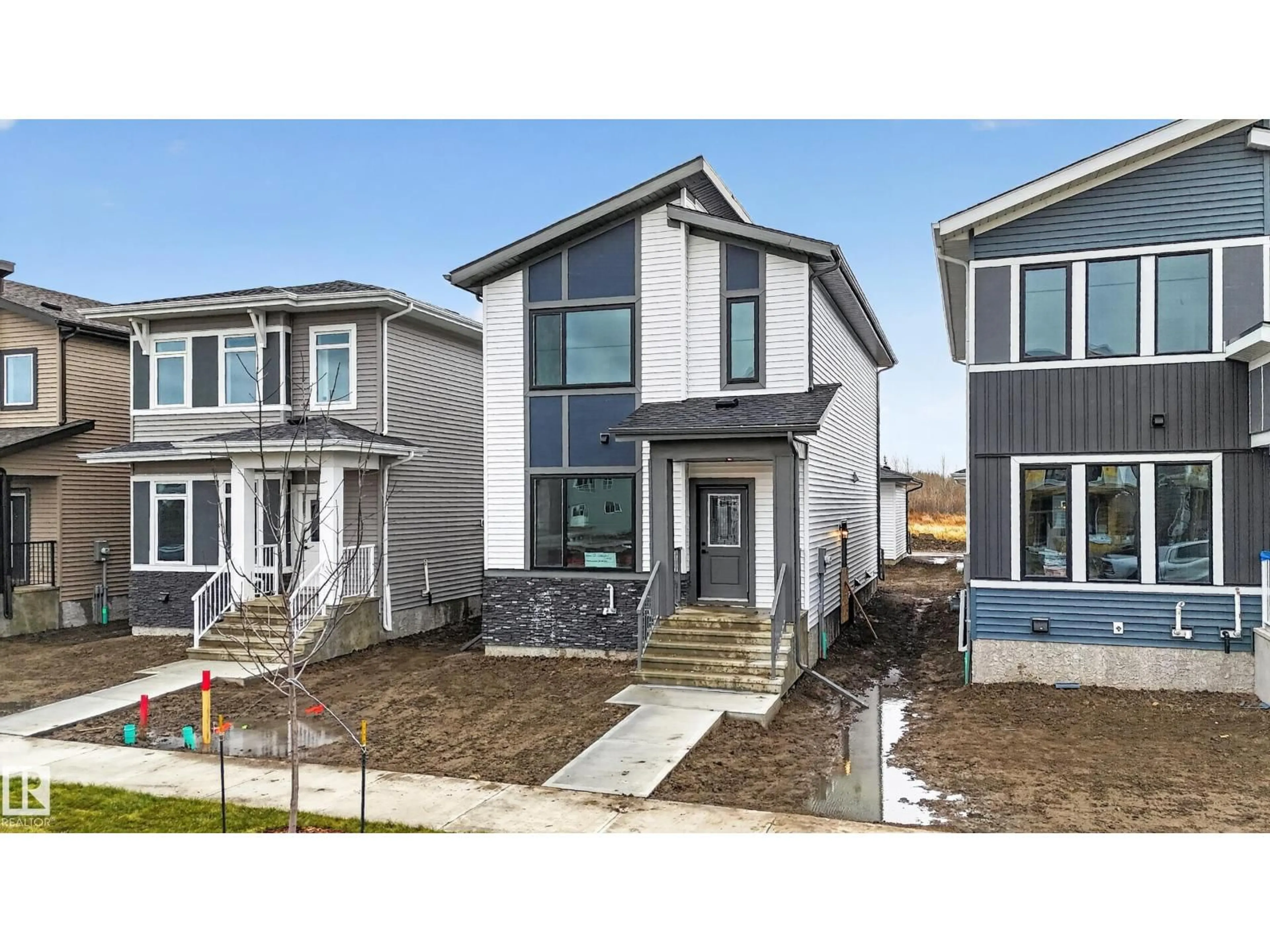 Home with vinyl exterior material, street for 113 WESTWIND DR, Spruce Grove Alberta T7X4C6