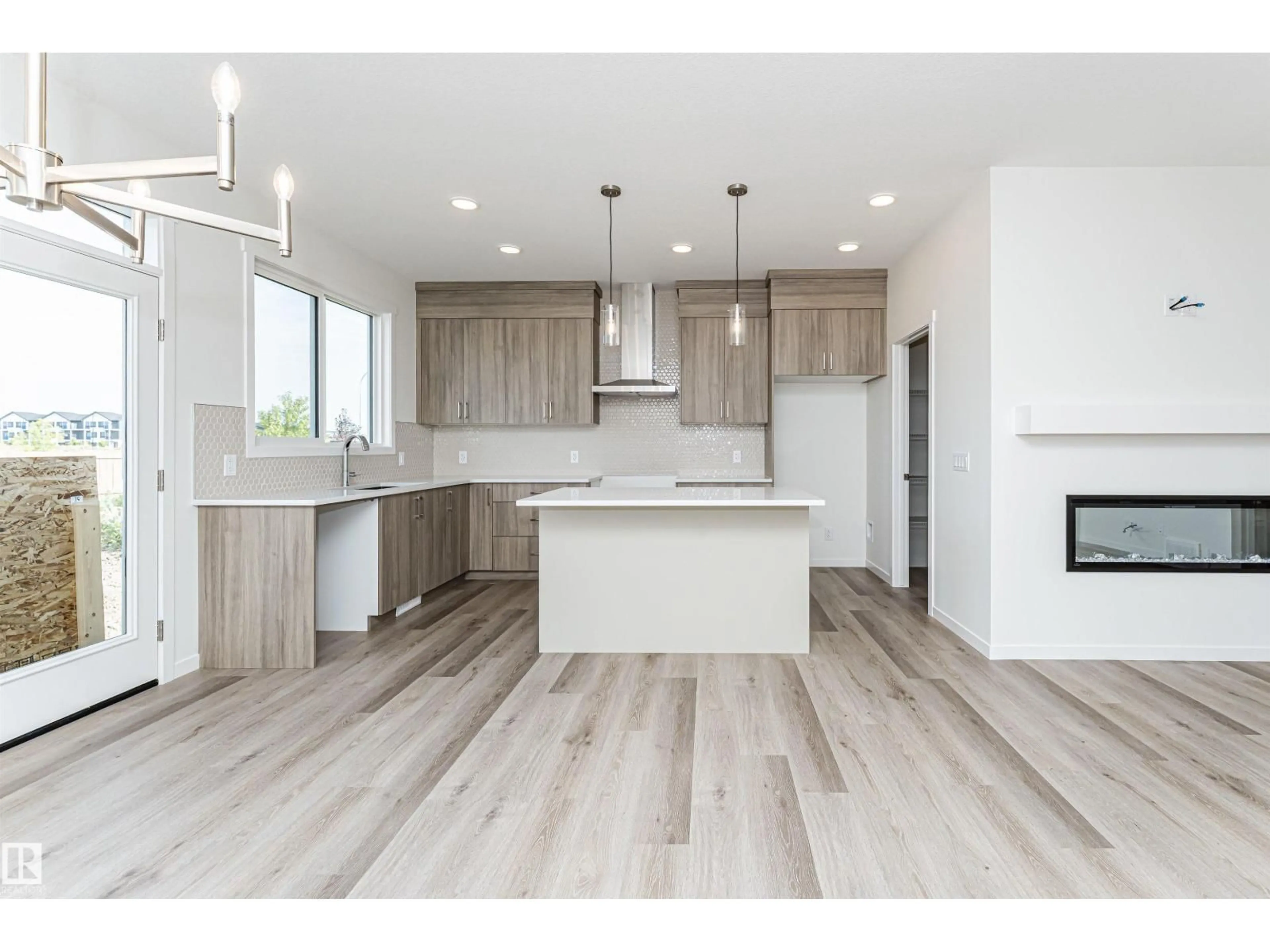 Open concept kitchen, wood/laminate floor for SW - 2308 160 ST, Edmonton Alberta T6W5X2