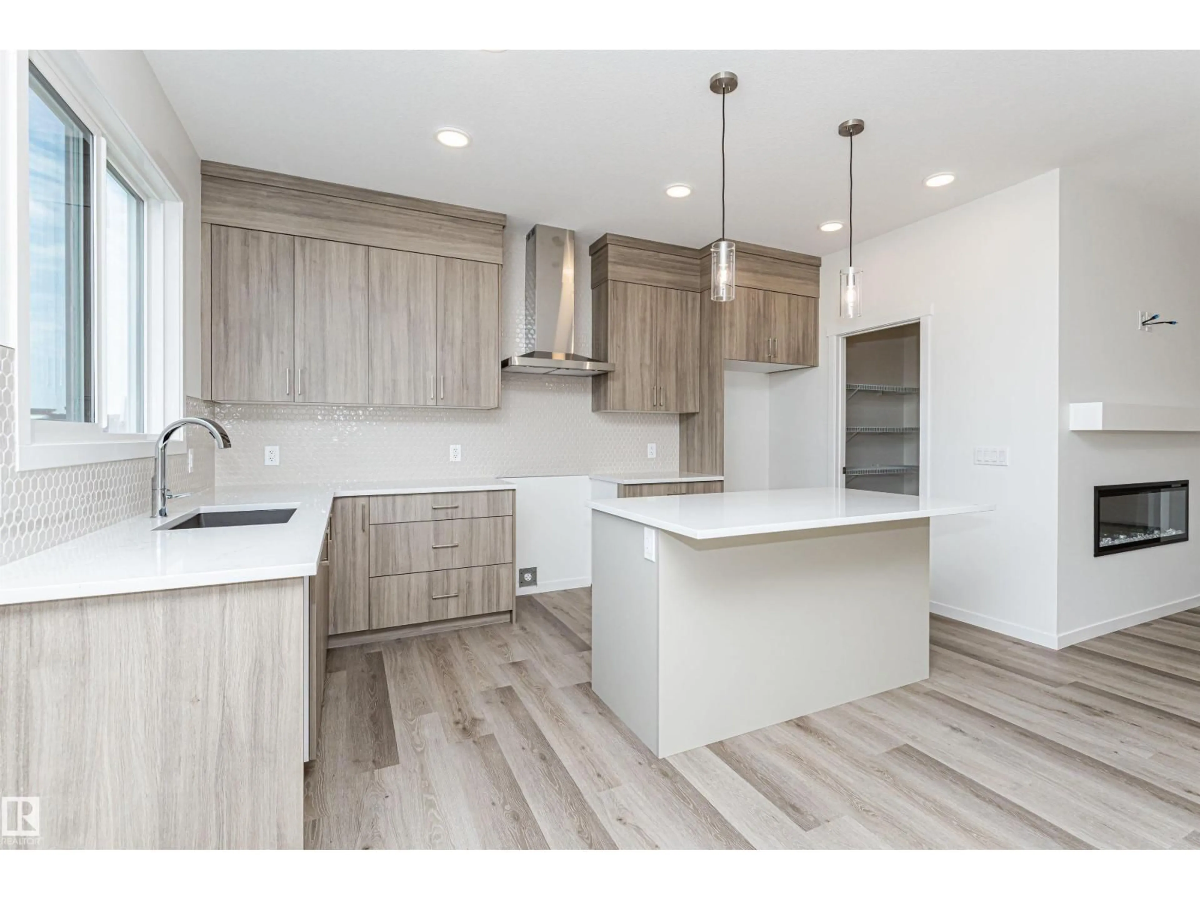 Open concept kitchen, wood/laminate floor for SW - 2308 160 ST, Edmonton Alberta T6W5X2