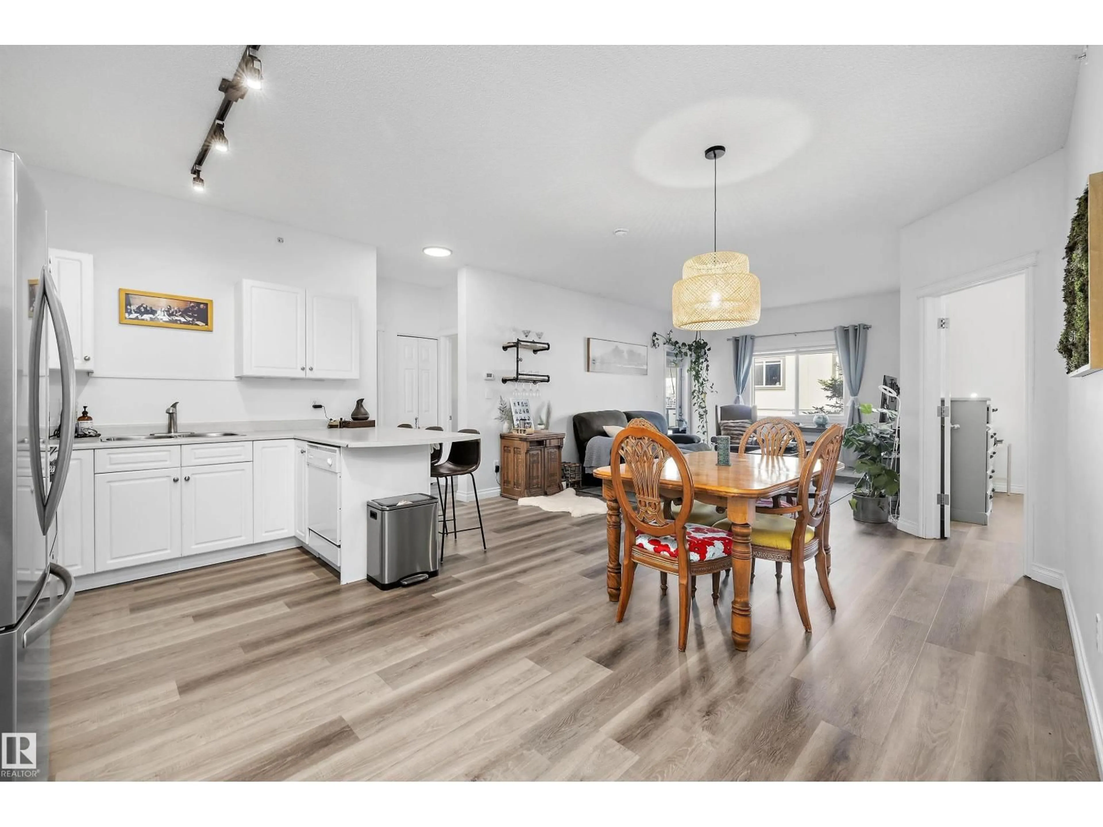 Open concept kitchen, wood/laminate floor for 405 - 304 LEWIS ESTATES BV, Edmonton Alberta T5T6Y7