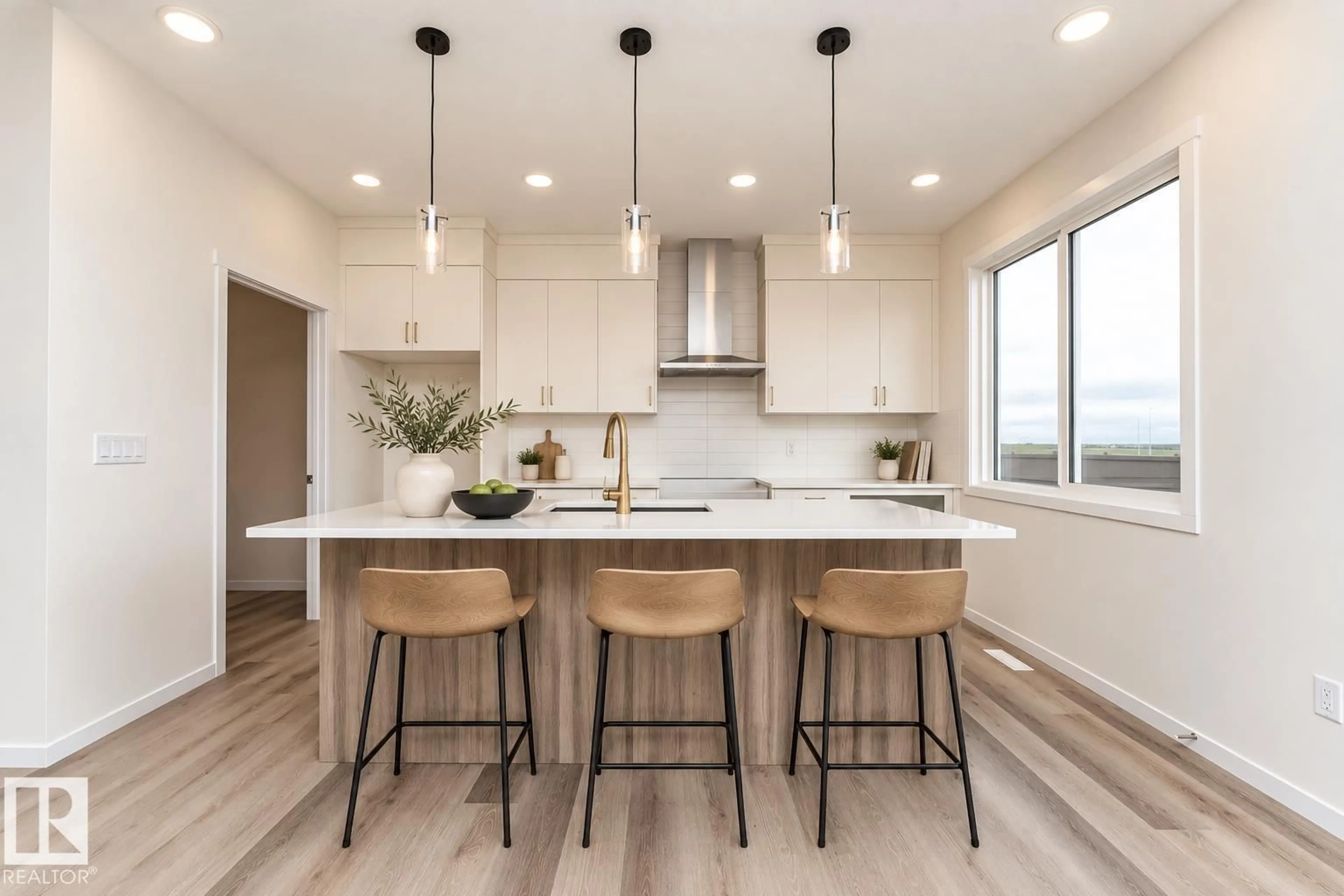 Open concept kitchen, wood/laminate floor for 6276 180 AV, Edmonton Alberta T5Y4L8