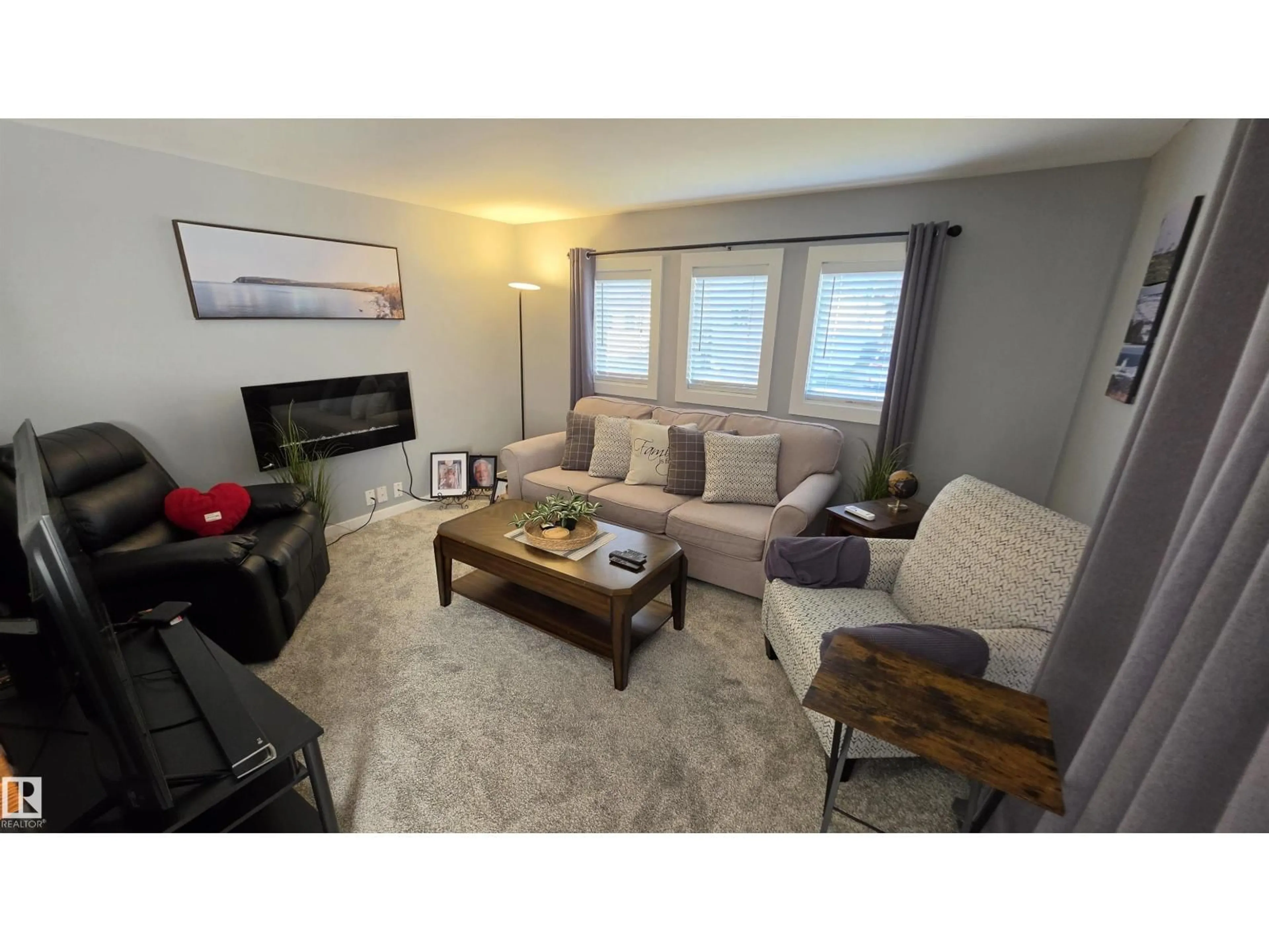 Living room with furniture, wood/laminate floor for 461 WESTVIEW CL, Edmonton Alberta T5S1T5