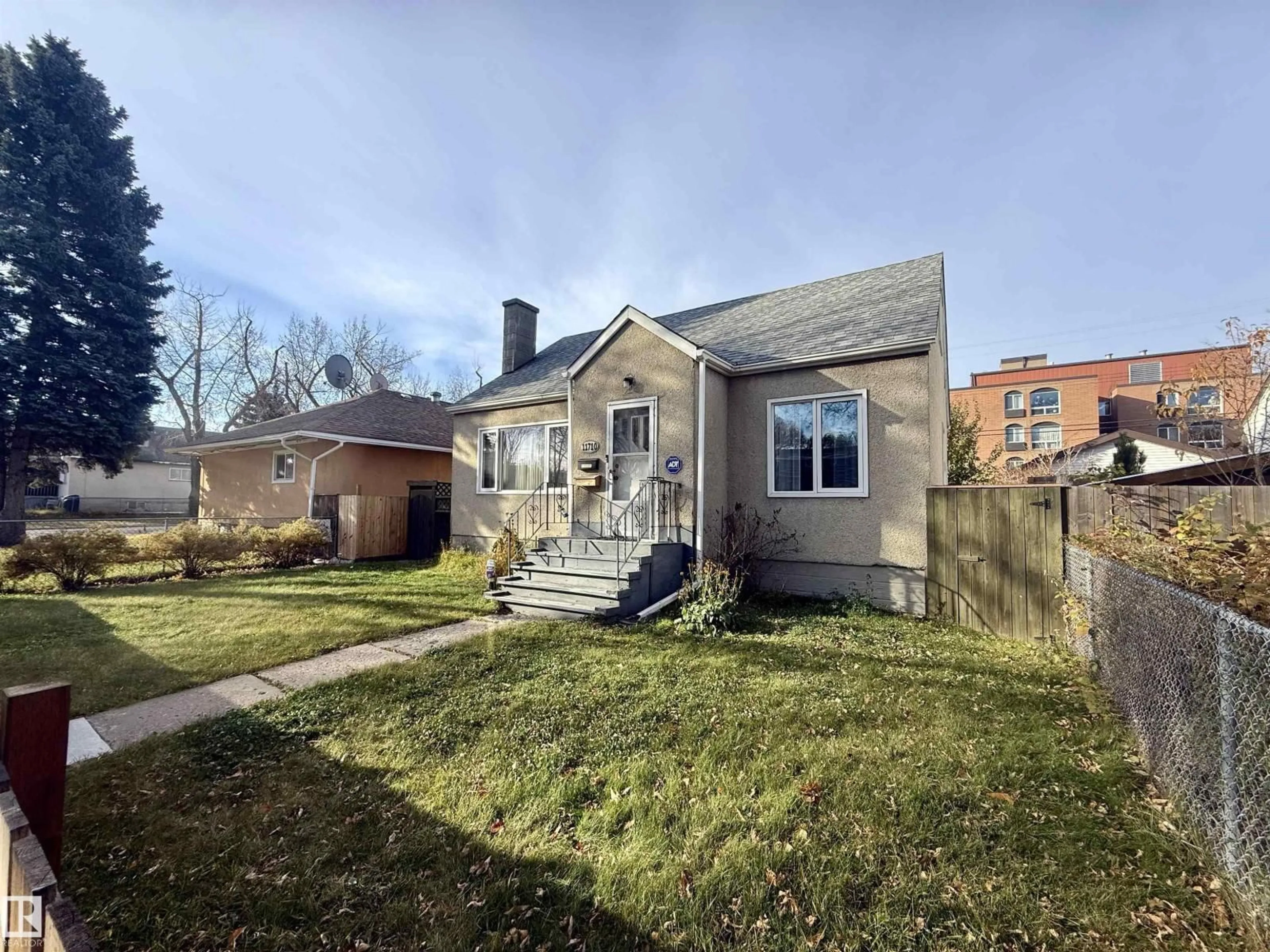 A pic from outside/outdoor area/front of a property/back of a property/a pic from drone, street for 11710 94 STREET, Edmonton Alberta T5G1J2