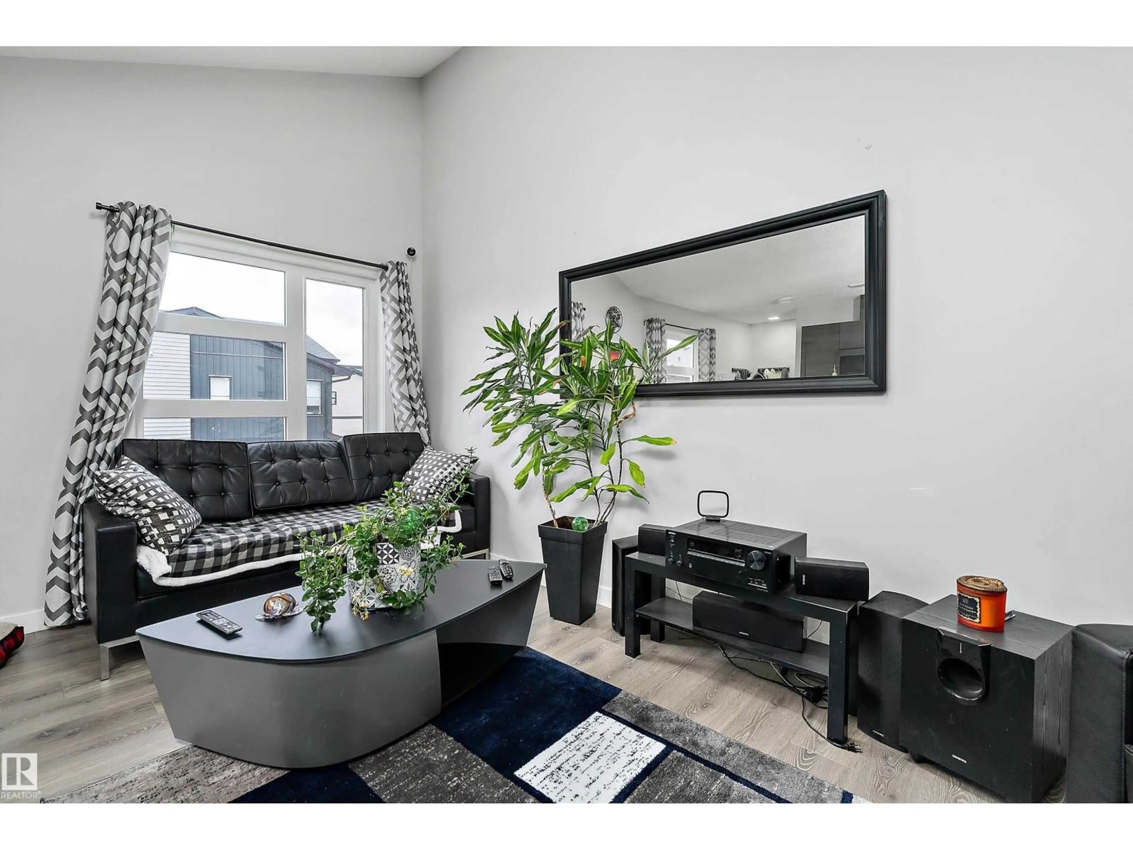 Living room with furniture, unknown for 69 1203 163 ST SW, Edmonton Alberta T6W3X1