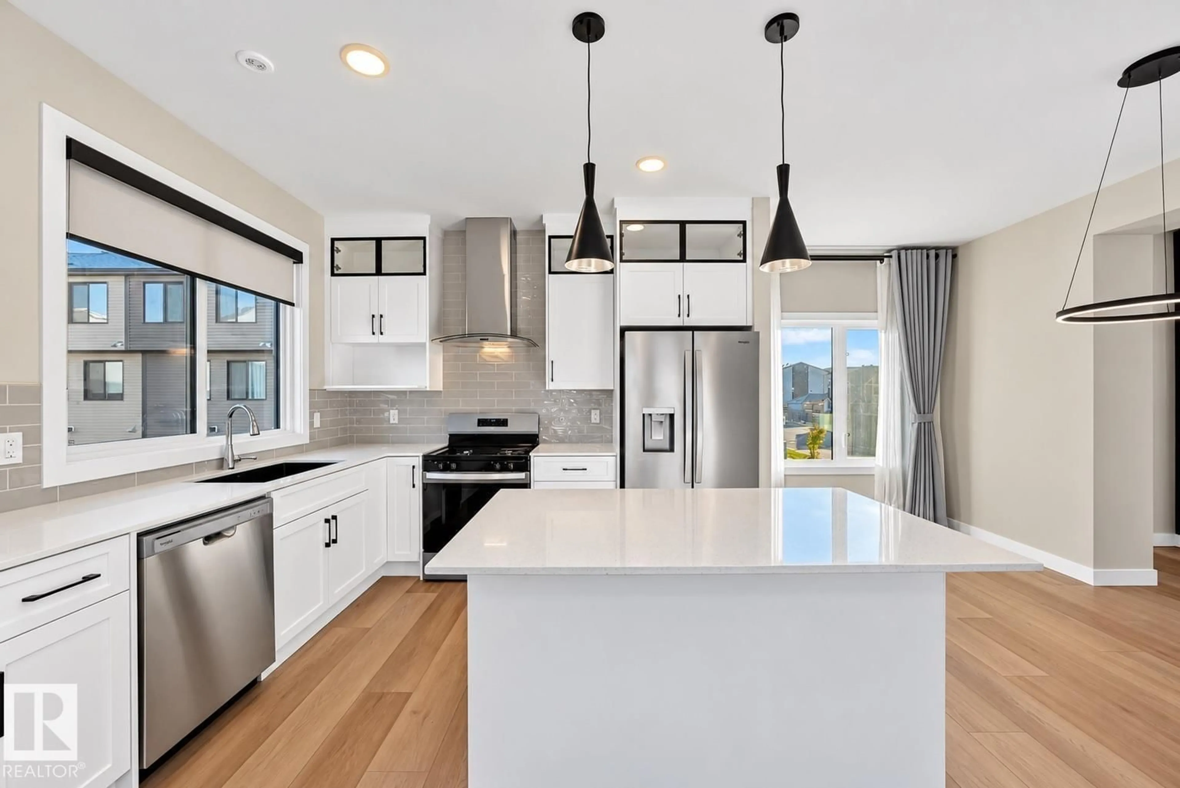Open concept kitchen, ceramic/tile floor for 11910 35 AV, Edmonton Alberta T6W4Z8
