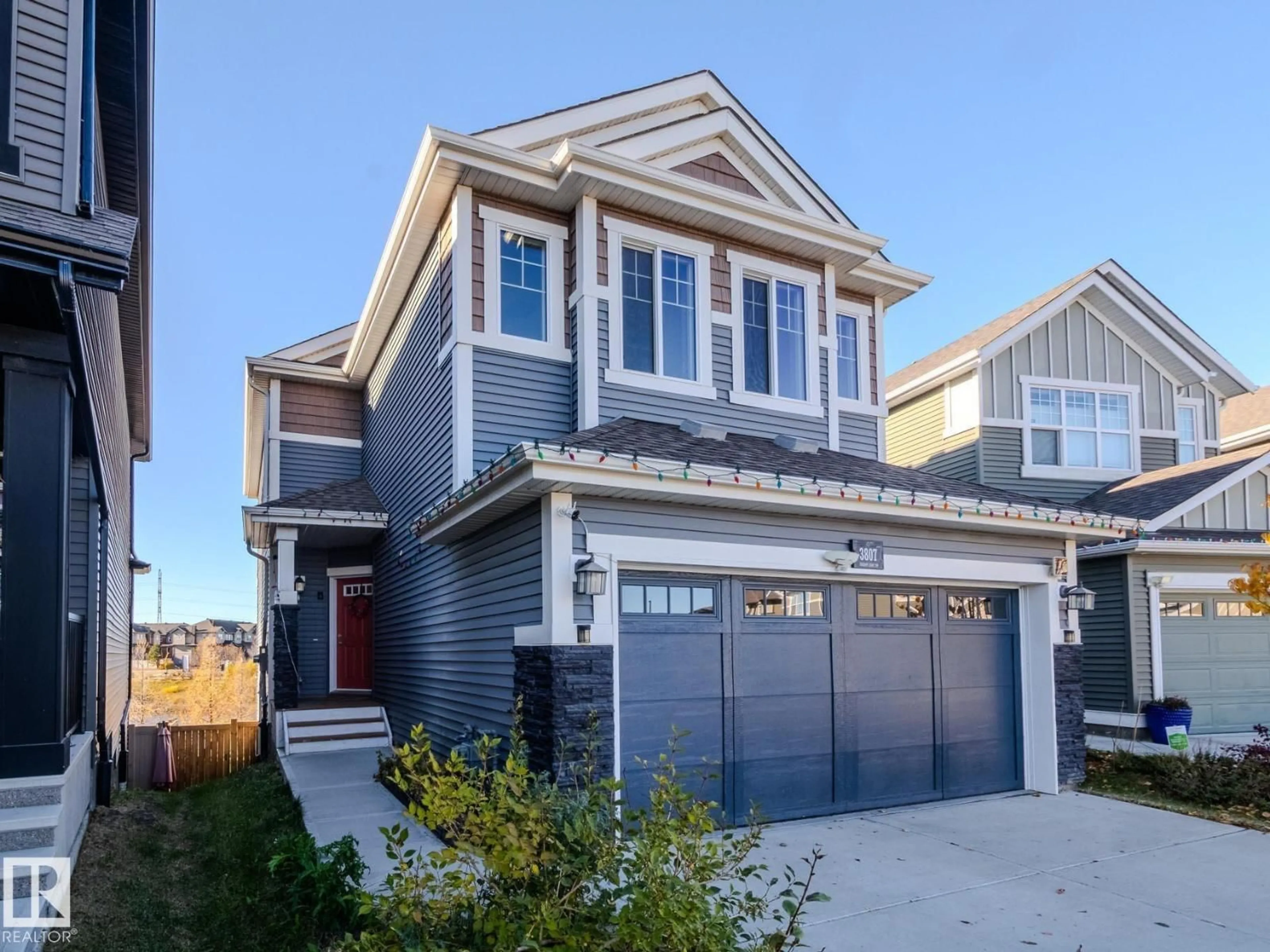 Home with vinyl exterior material, street for 3807 CHERRY LO, Edmonton Alberta T6X2K7