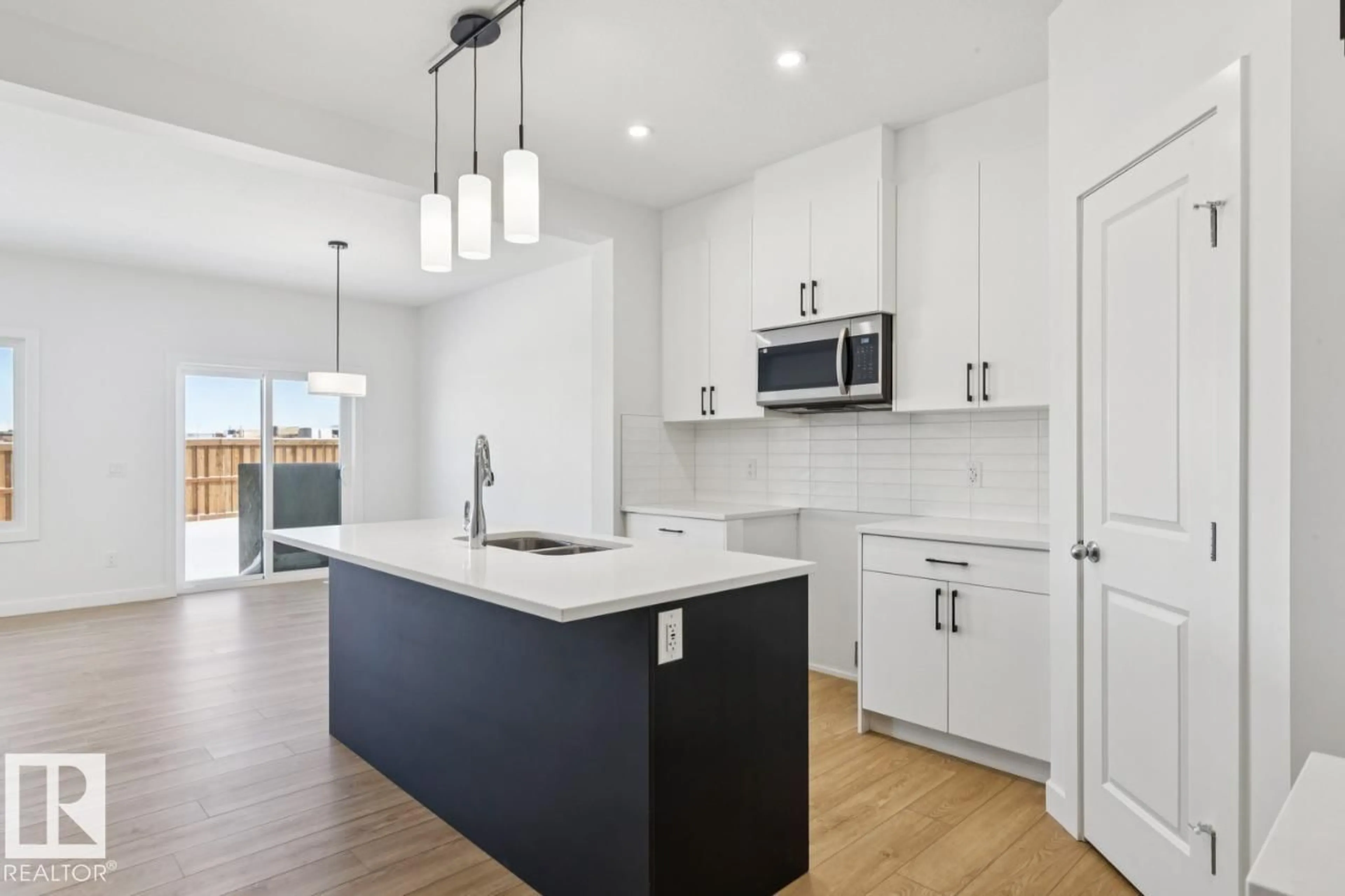 Open concept kitchen, unknown for 130 LEMON CL, Spruce Grove Alberta T7X0G8