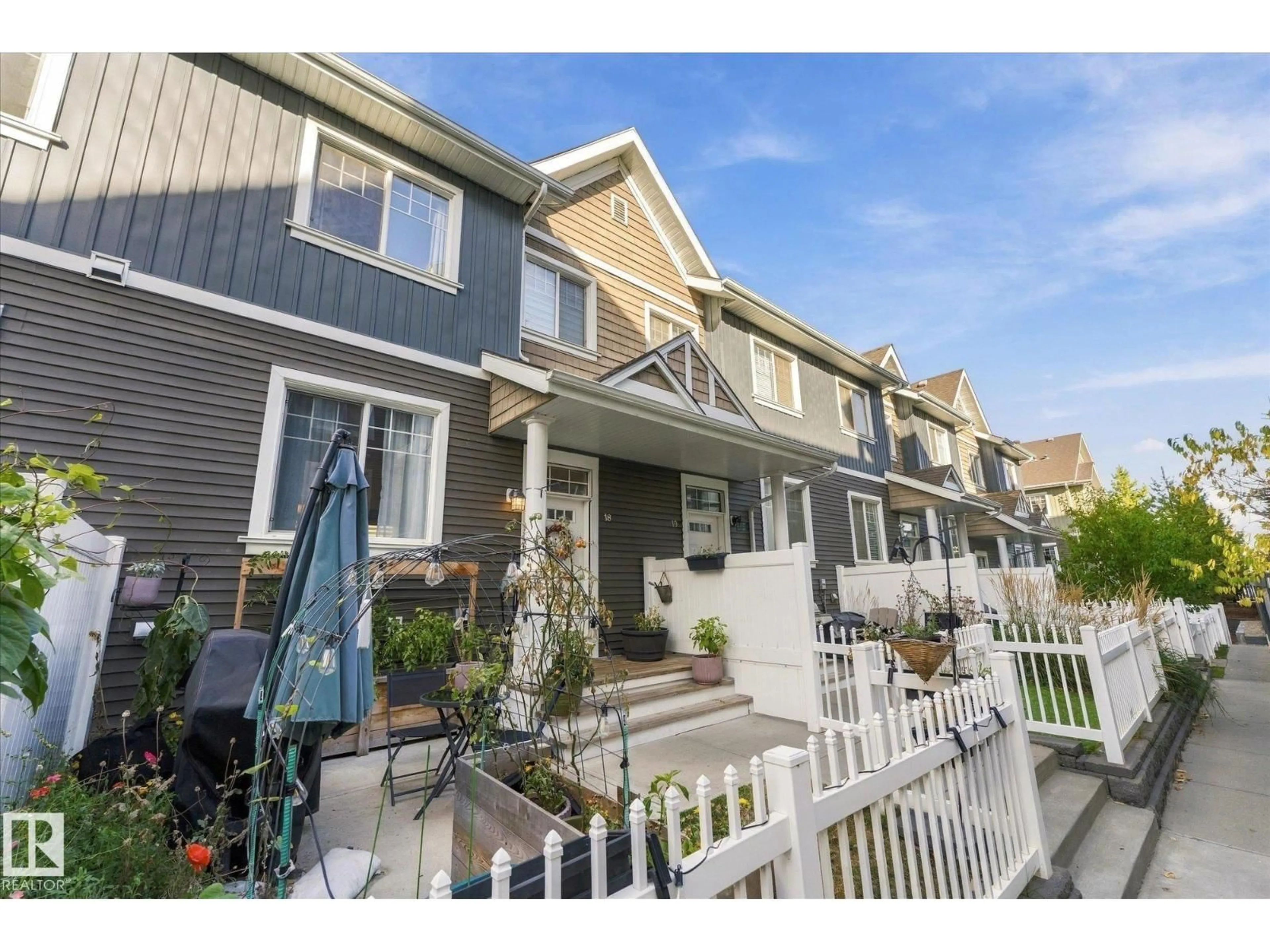 Home with vinyl exterior material, street for 4050 - 18 SAVARYN DR, Edmonton Alberta T6X1R8