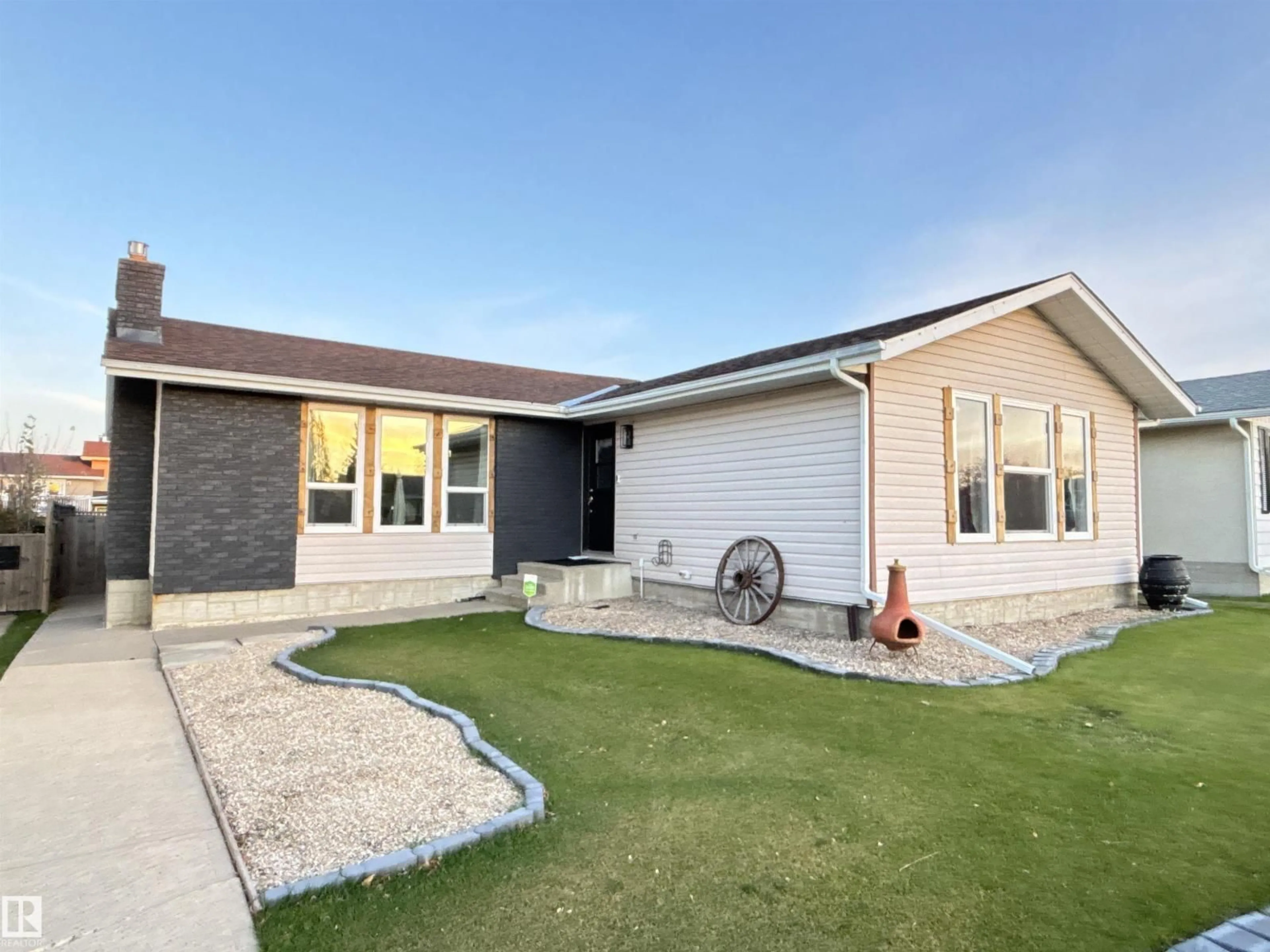 Home with vinyl exterior material, street for 10367 109 AV, Westlock Alberta T7P1G8