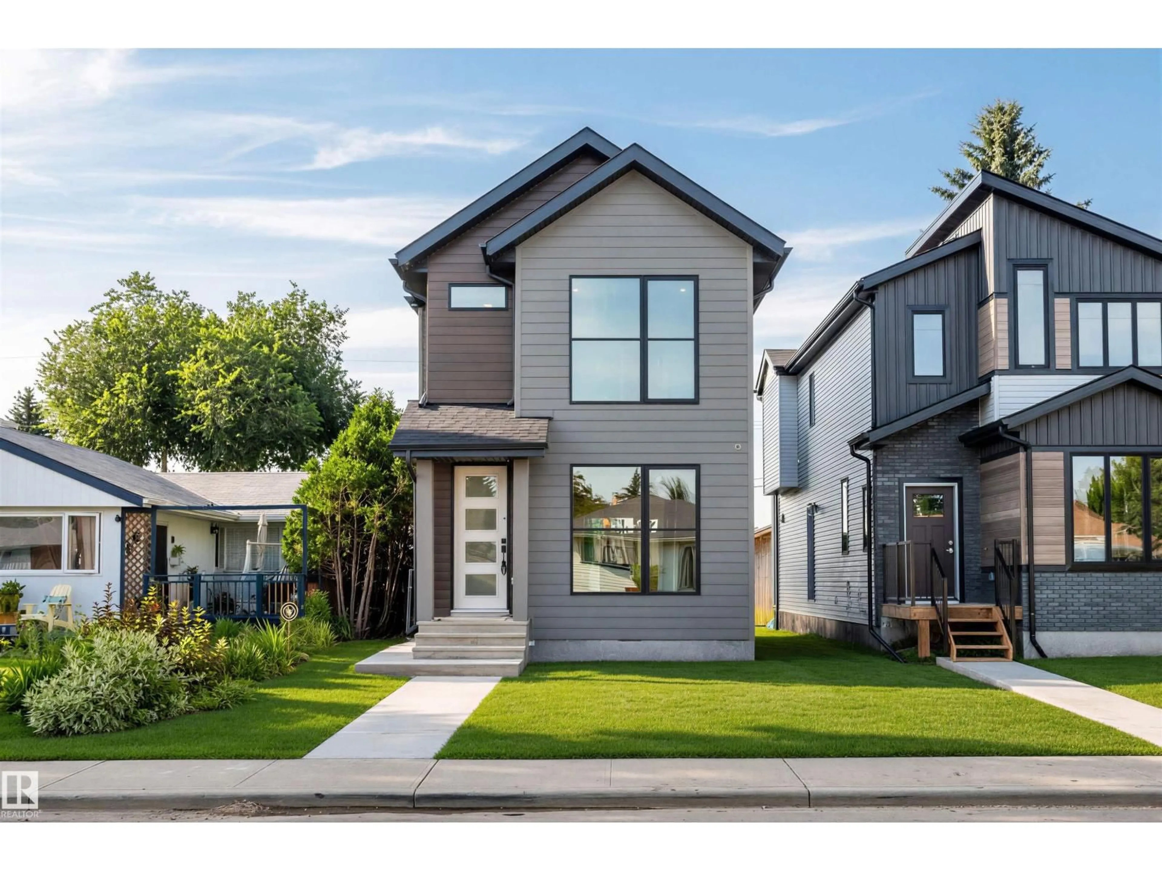 Home with vinyl exterior material, street for 5606 105 AV, Edmonton Alberta T6A1A6