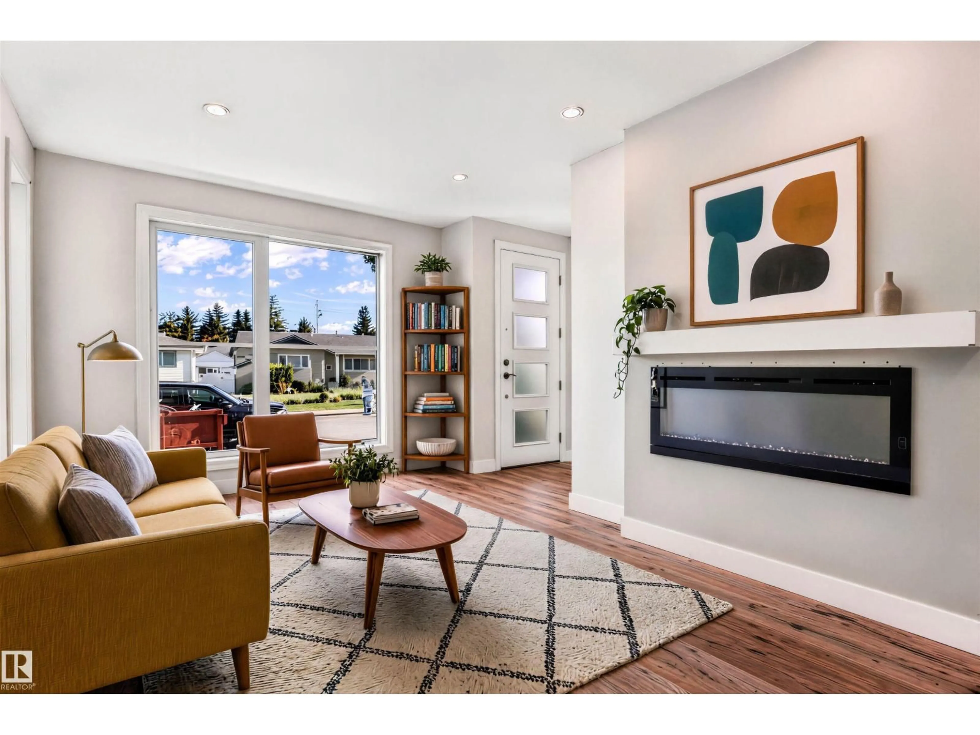 Living room with furniture, unknown for 5606 105 AV, Edmonton Alberta T6A1A6