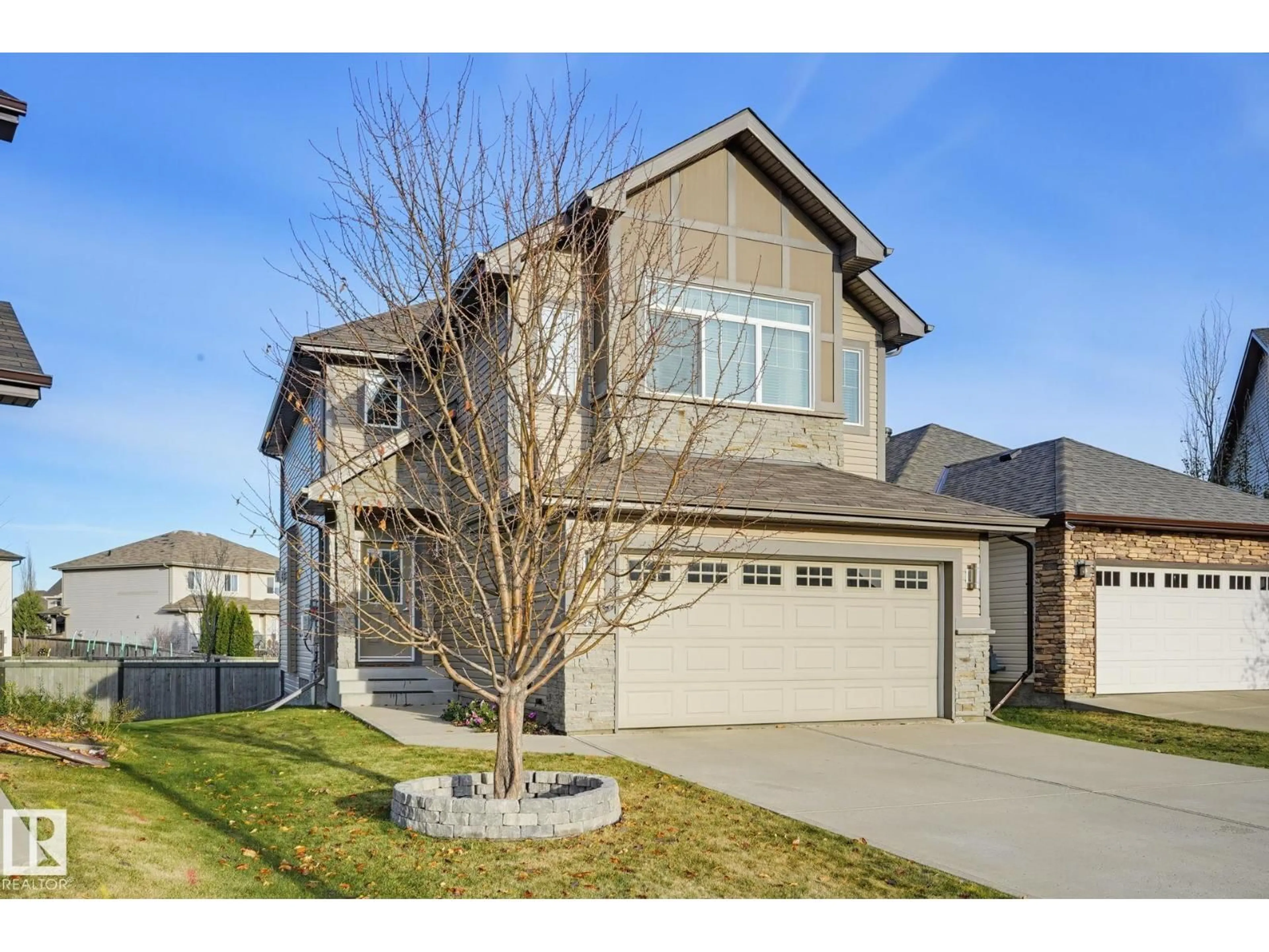 Home with brick exterior material, street for SW - 729 175A ST, Edmonton Alberta T6W2G5