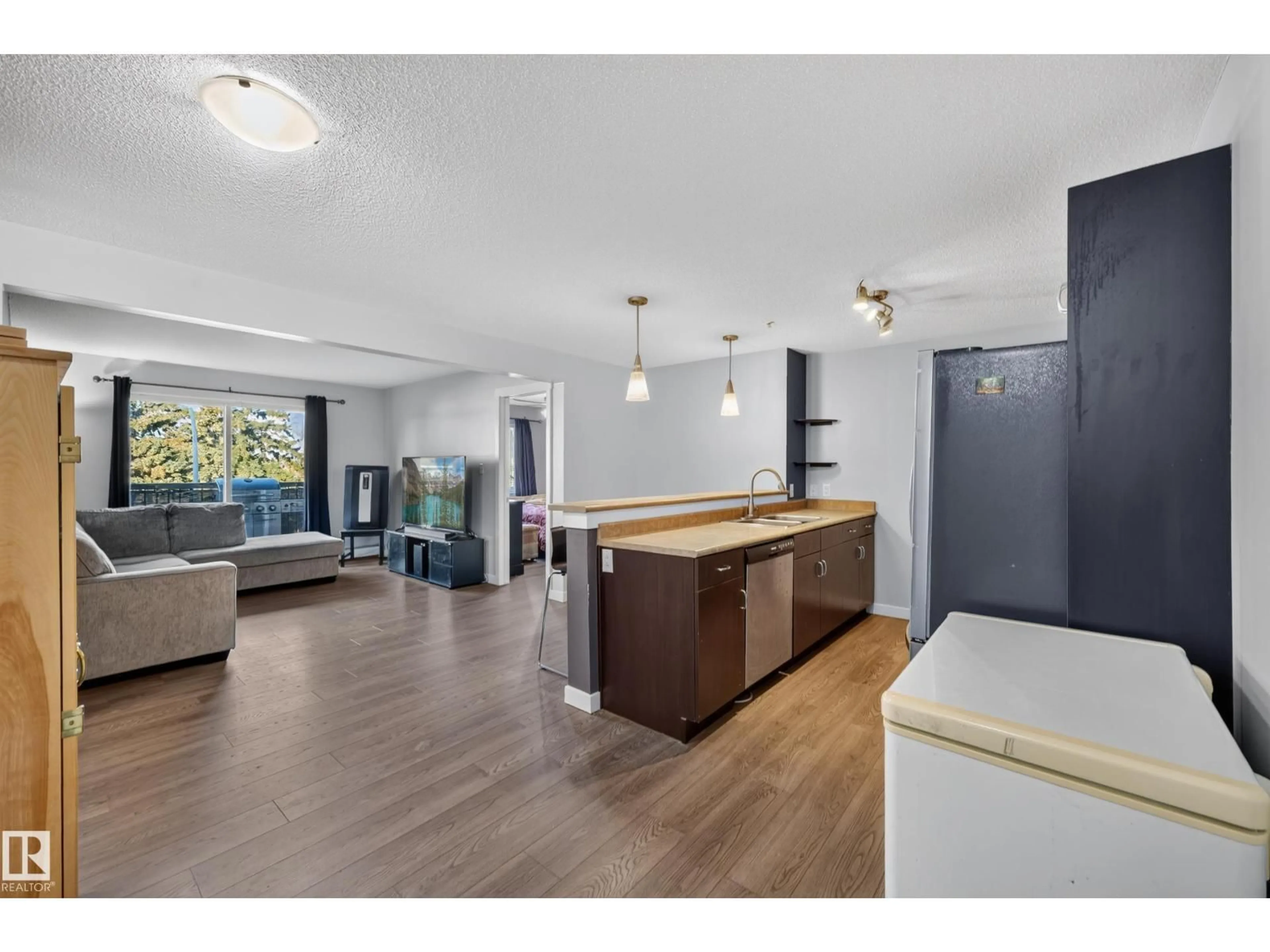 Open concept kitchen, unknown for #326 - 1180 HYNDMAN RD, Edmonton Alberta T5A0P8