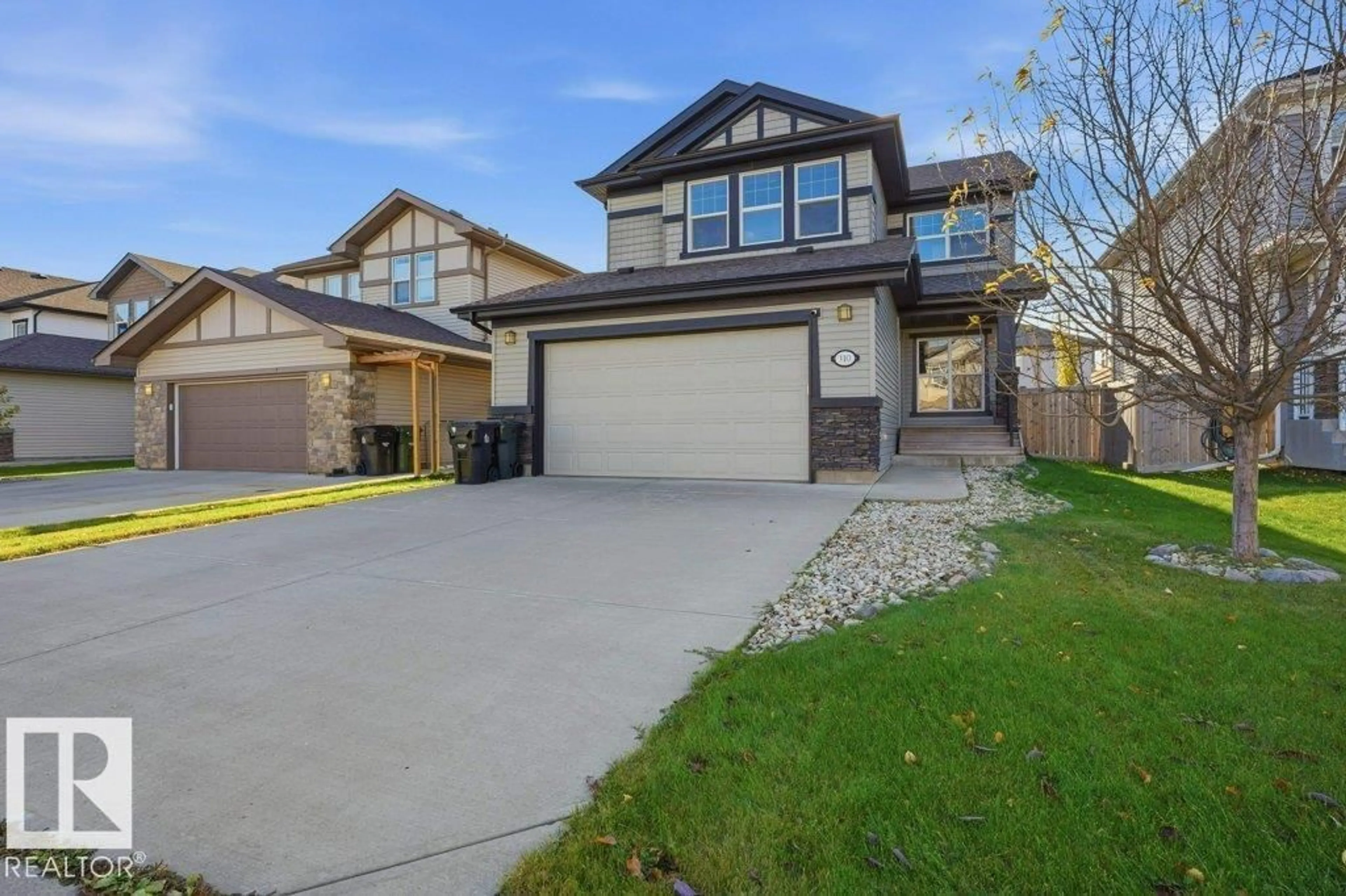 A pic from outside/outdoor area/front of a property/back of a property/a pic from drone, street for 110 MEADOWLAND WY, Spruce Grove Alberta T7X0S4