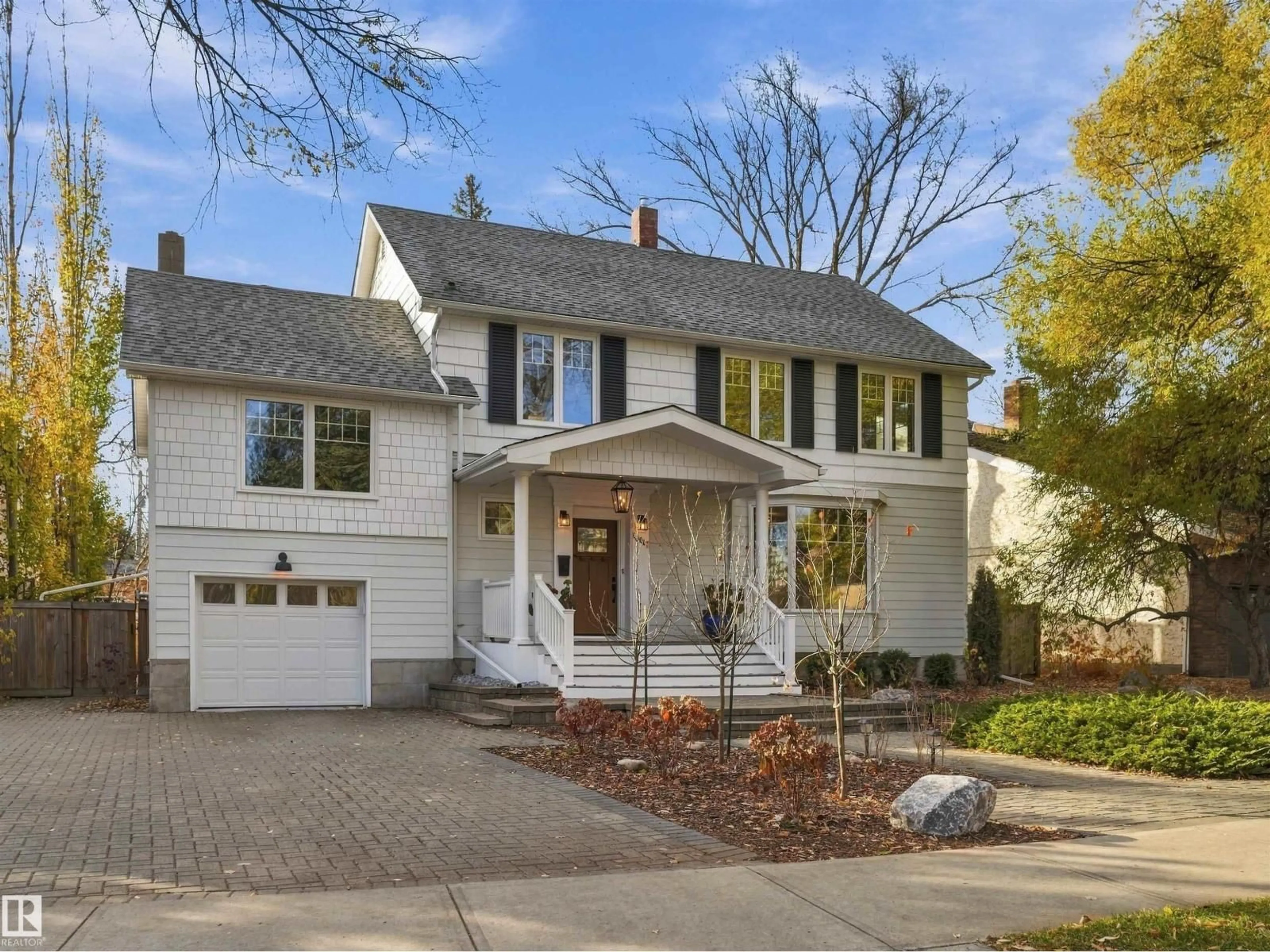 Home with brick exterior material, street for 13017 104 AV, Edmonton Alberta T5N0V9