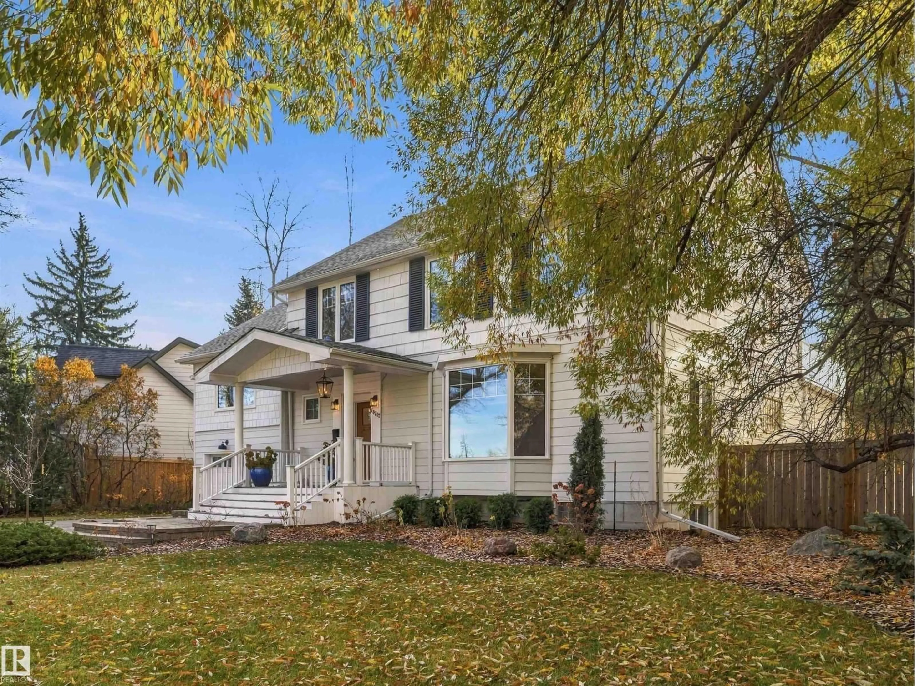Home with vinyl exterior material, street for 13017 104 AV, Edmonton Alberta T5N0V9