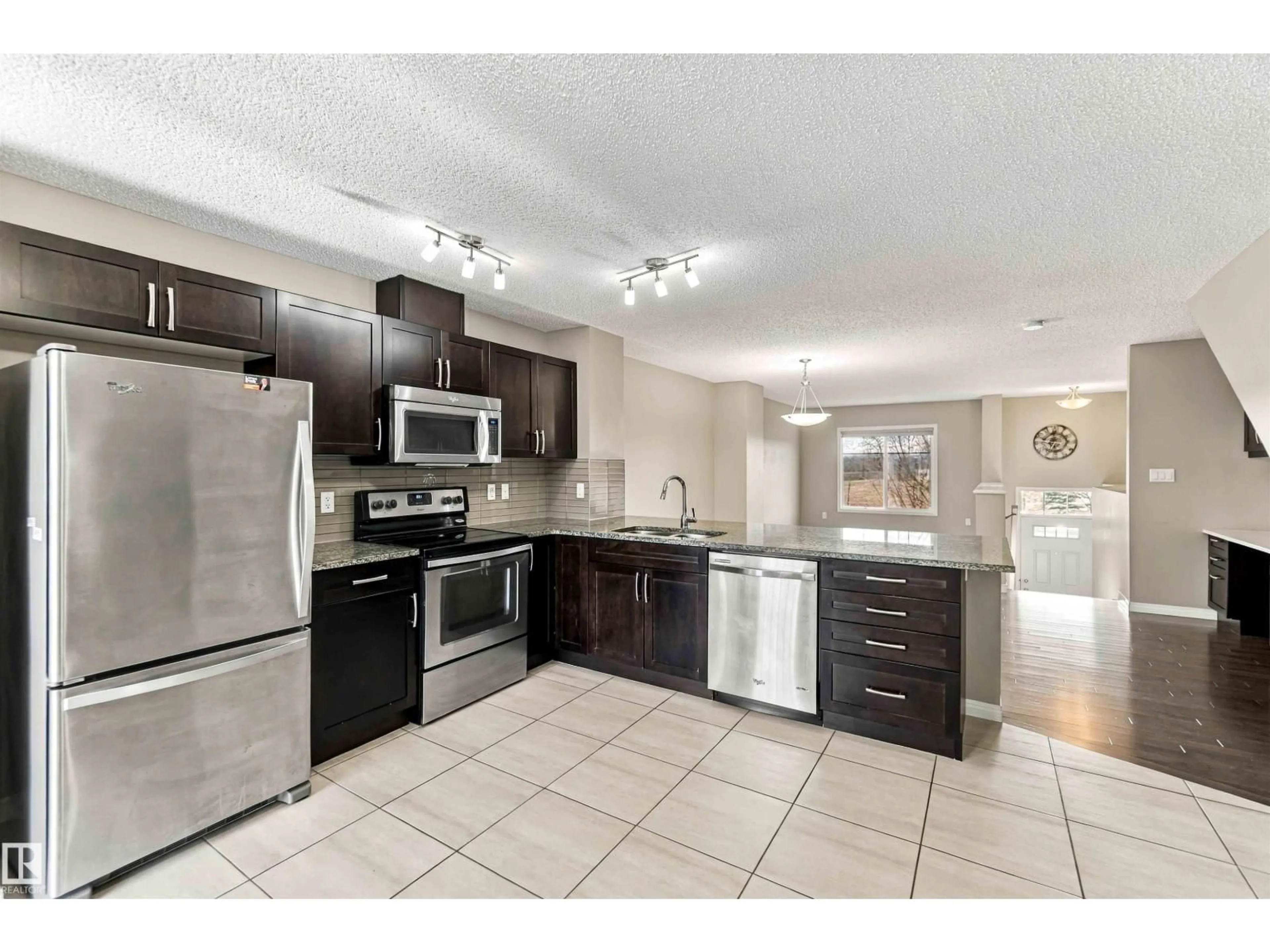 Open concept kitchen, ceramic/tile floor for #2 - 1140 CHAPPELLE BV, Edmonton Alberta T6W2Z3