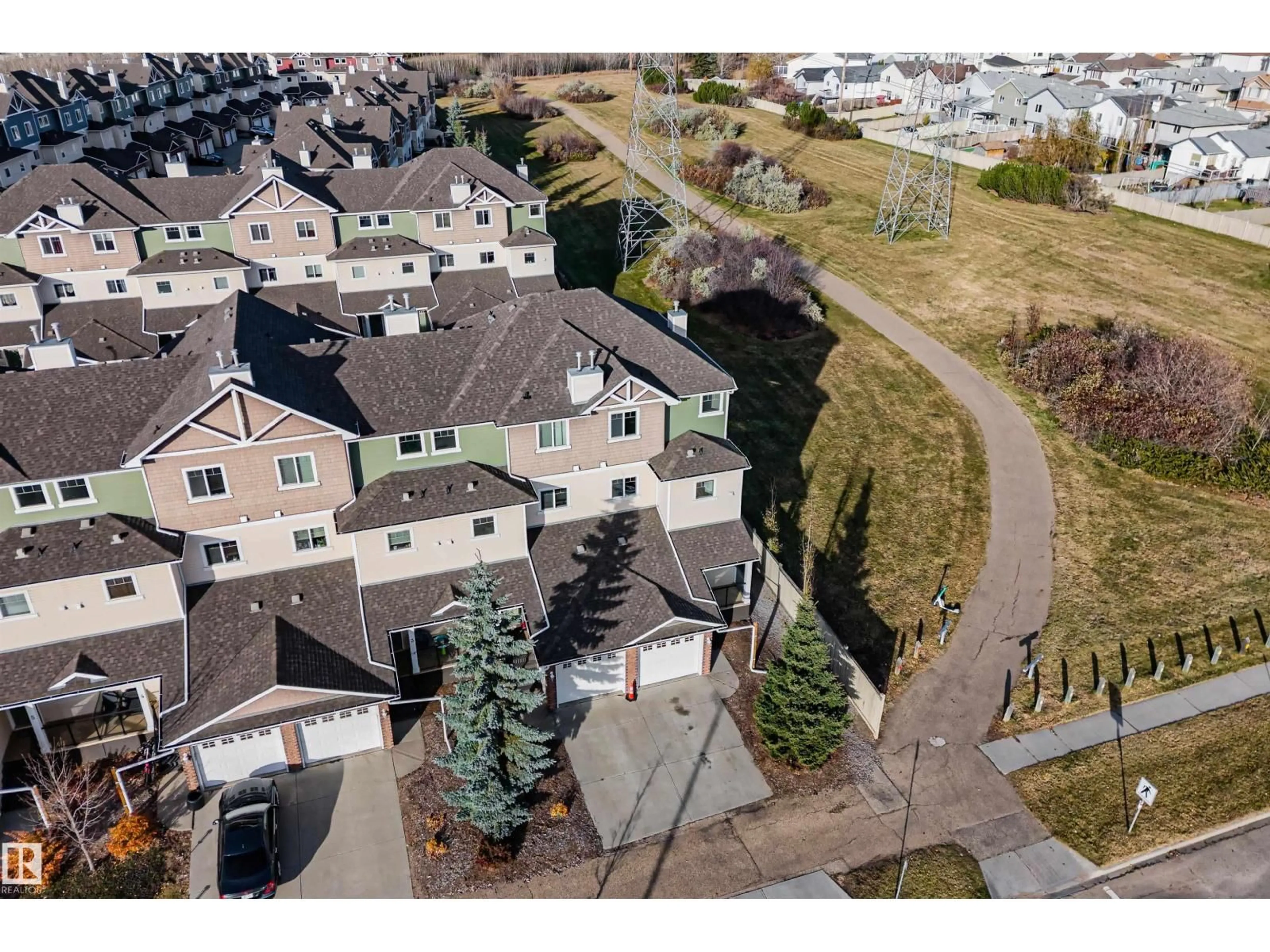 A pic from outside/outdoor area/front of a property/back of a property/a pic from drone, street for #1 - 3010 33 AV, Edmonton Alberta T6T0C3