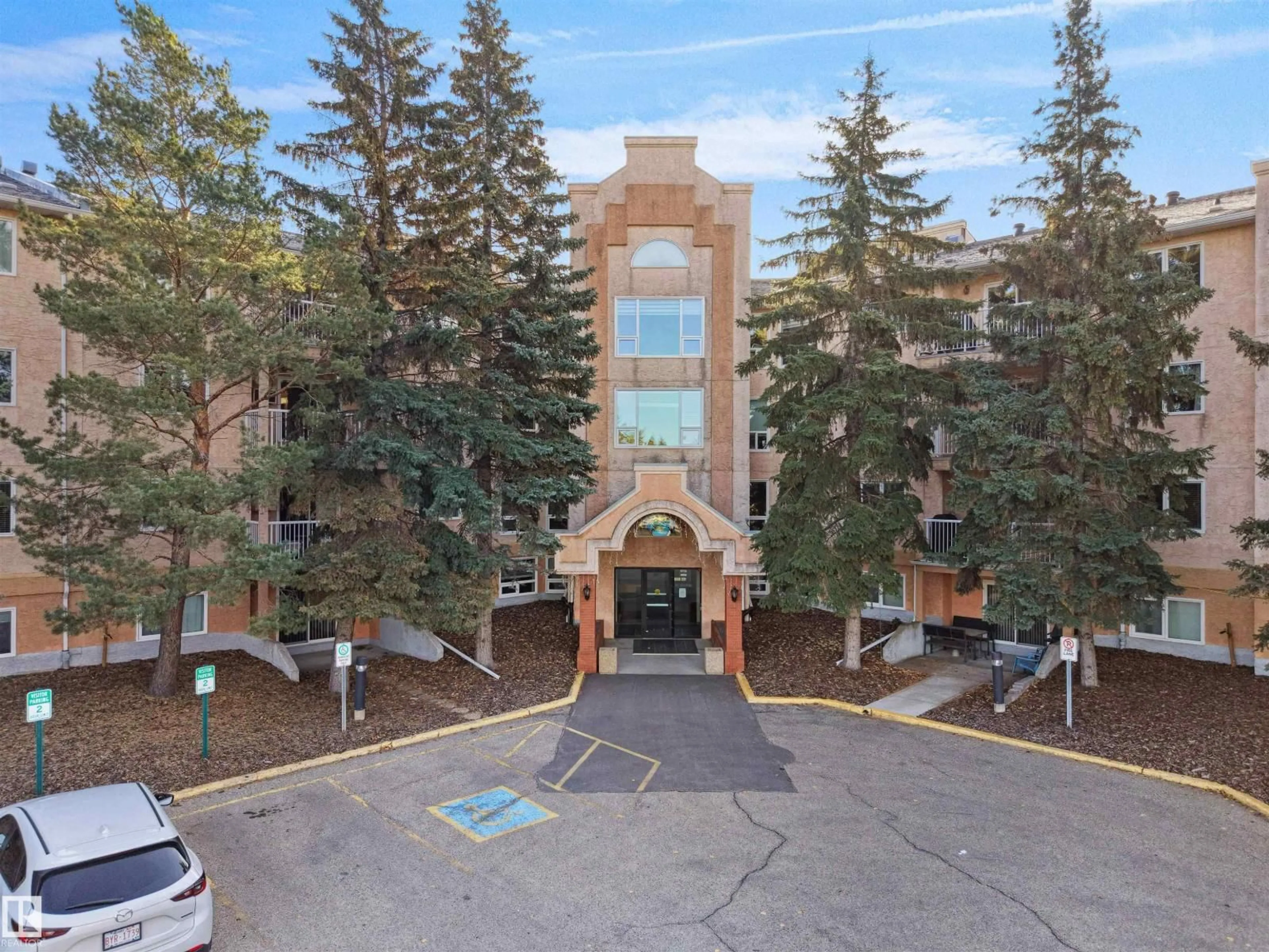 A pic from outside/outdoor area/front of a property/back of a property/a pic from drone, mountain view for 314 10935 21 AV NW, Edmonton Alberta T6J6R3