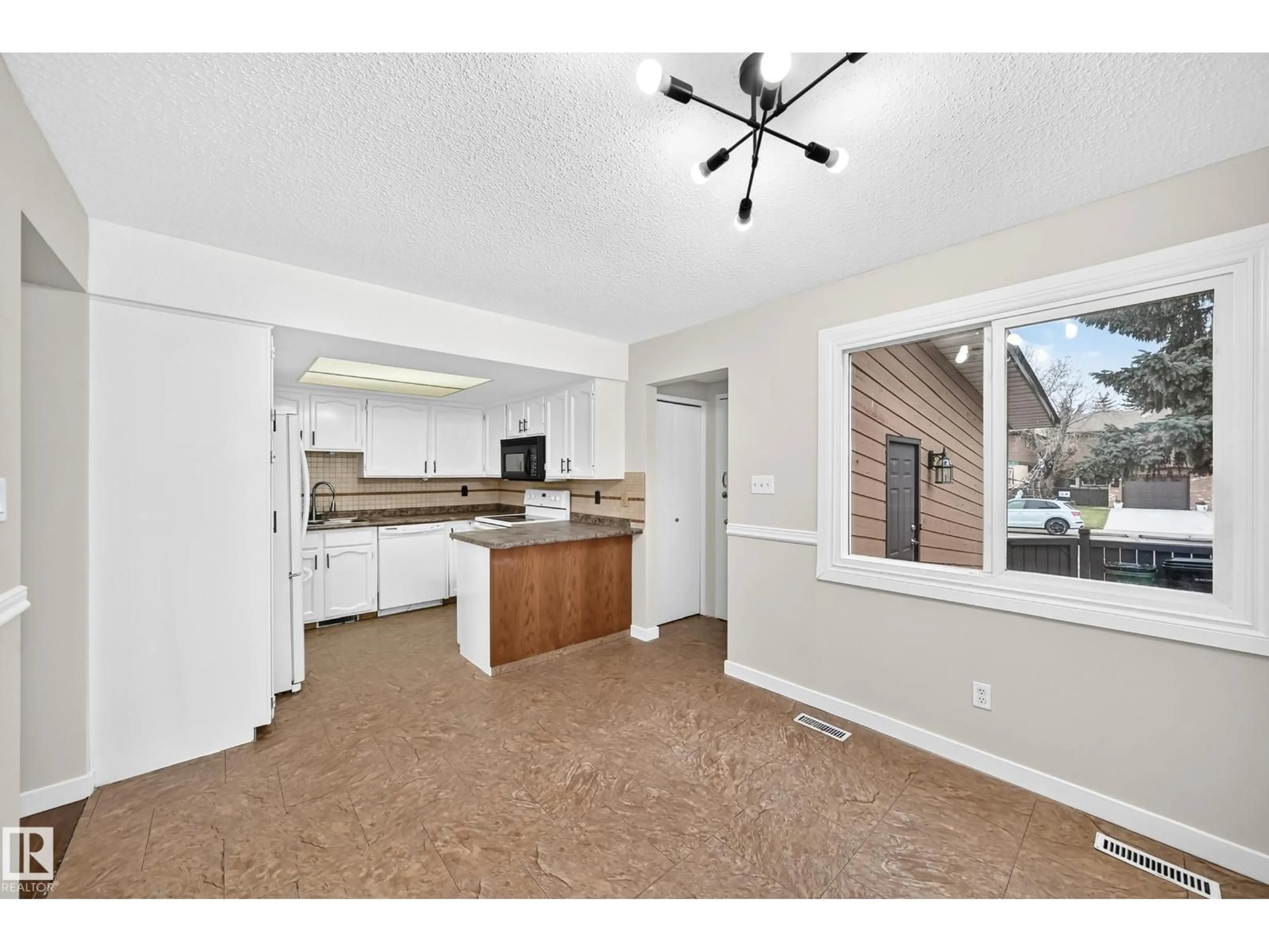 Open concept kitchen, unknown for NW - 13621 28 ST, Edmonton Alberta T5A4B5