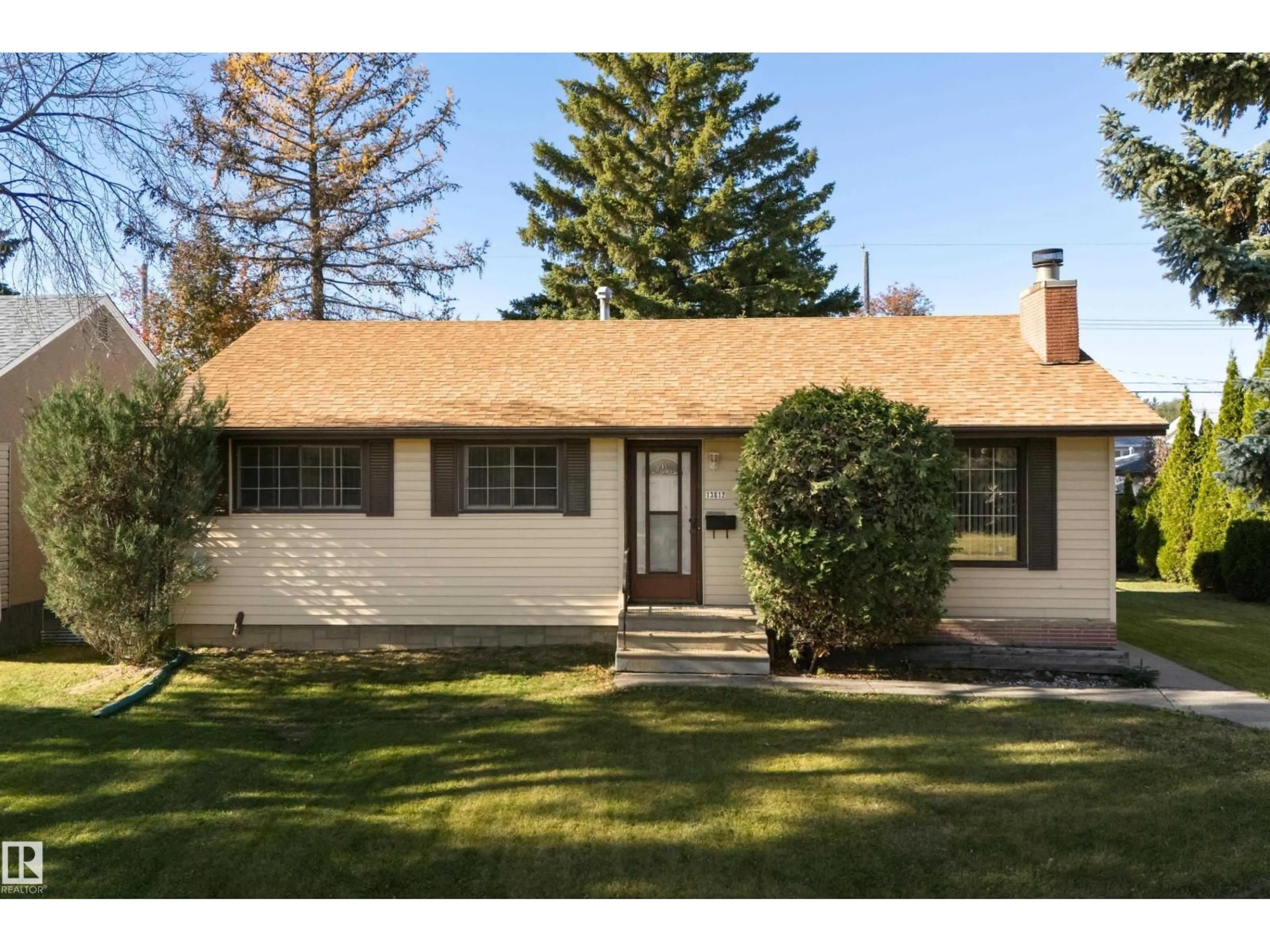 Home with vinyl exterior material, street for NW - 13612 137 ST, Edmonton Alberta T5L2B3