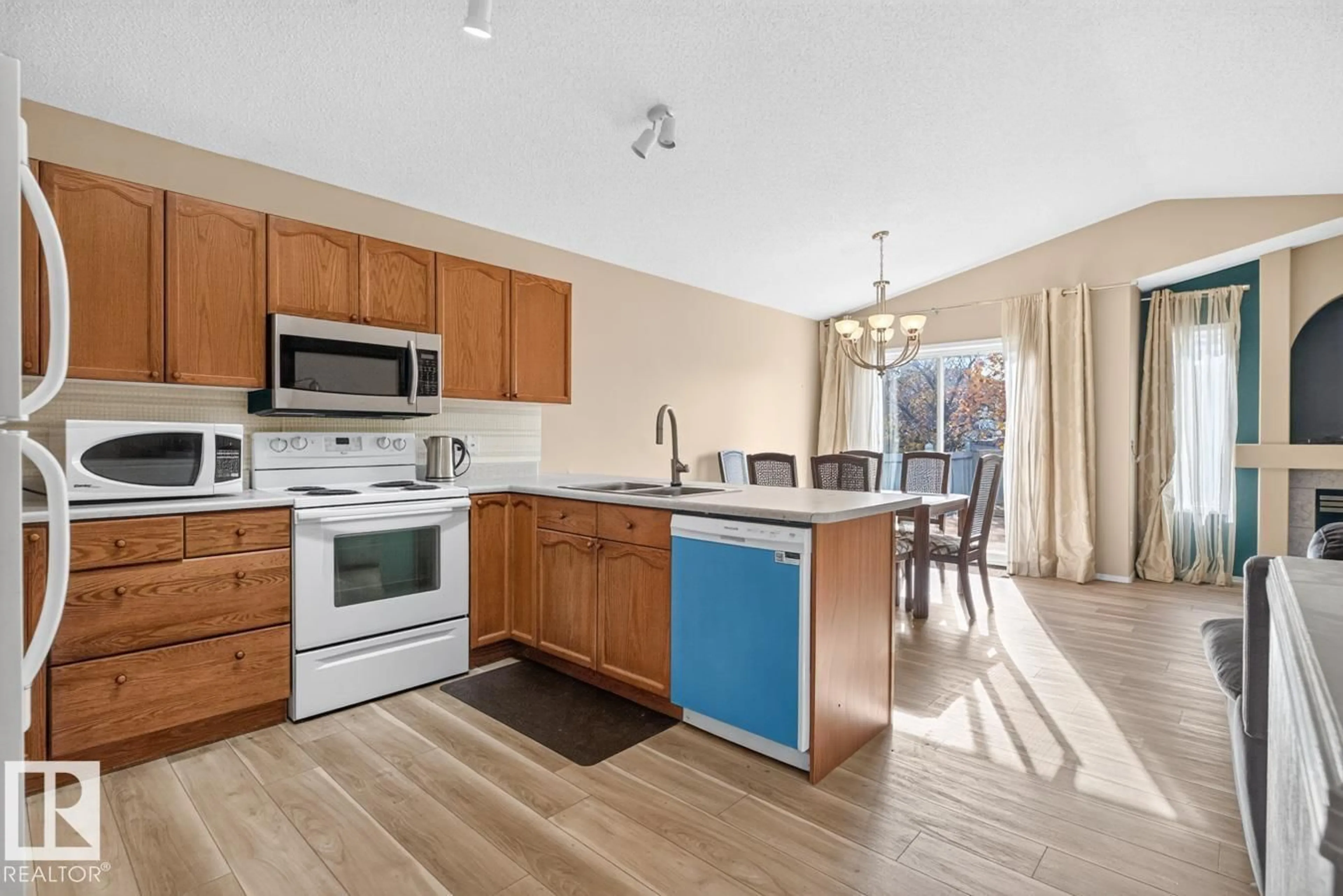 Open concept kitchen, unknown for NW - 17920 99 ST, Edmonton Alberta T5X6A2