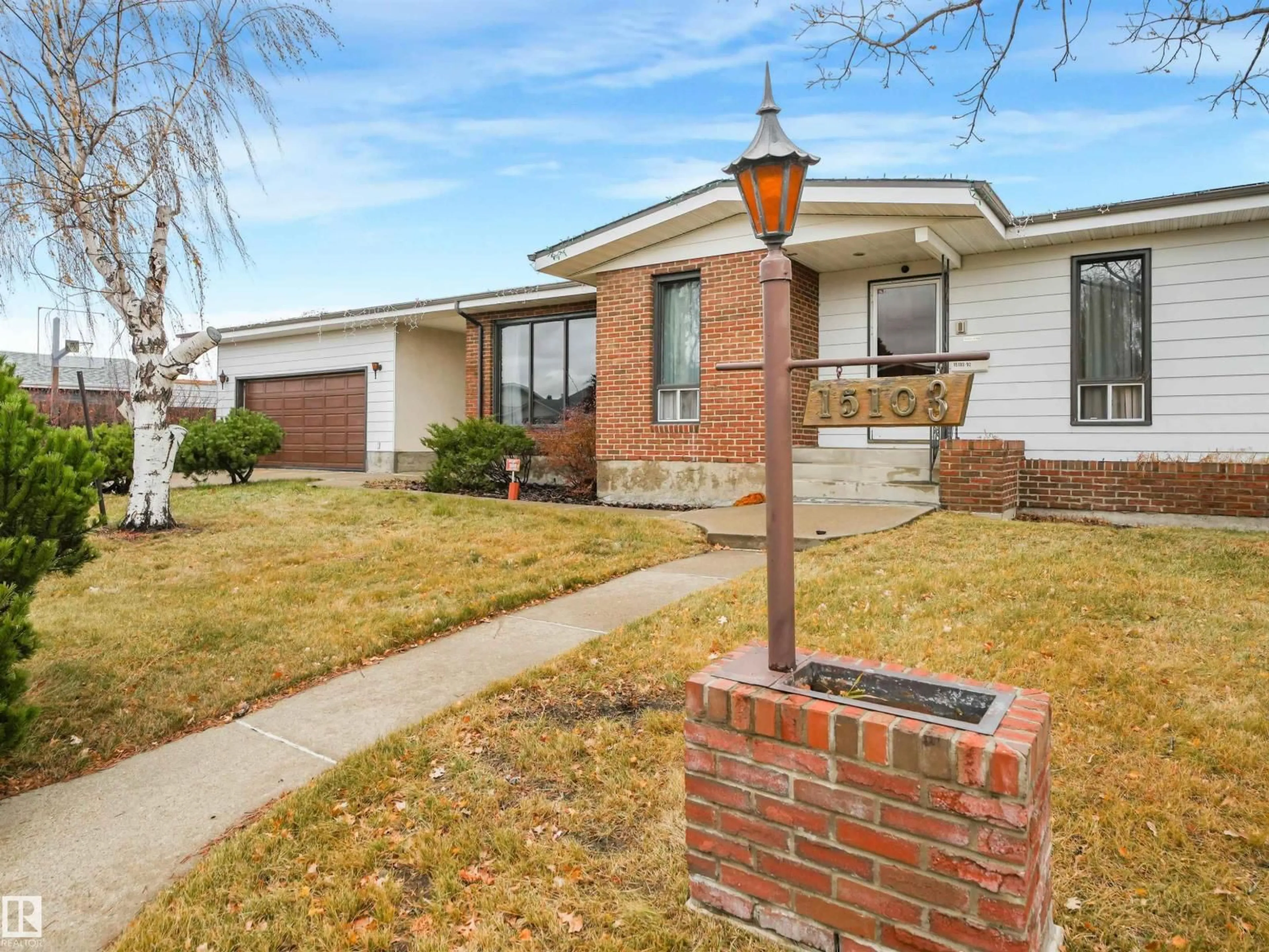 Home with brick exterior material, street for 15103 92 ST, Edmonton Alberta T5E5V1