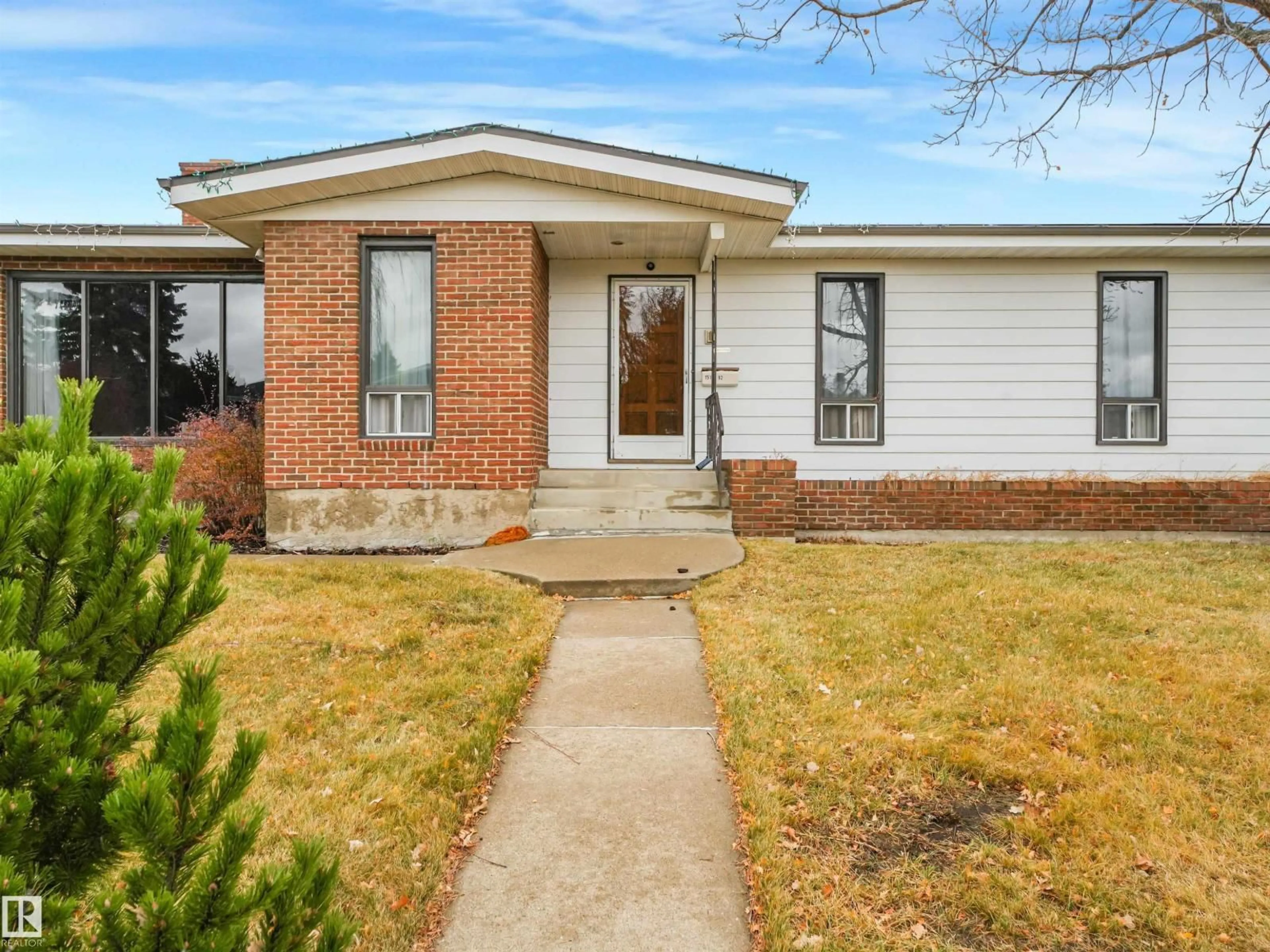 Home with brick exterior material, street for 15103 92 ST, Edmonton Alberta T5E5V1