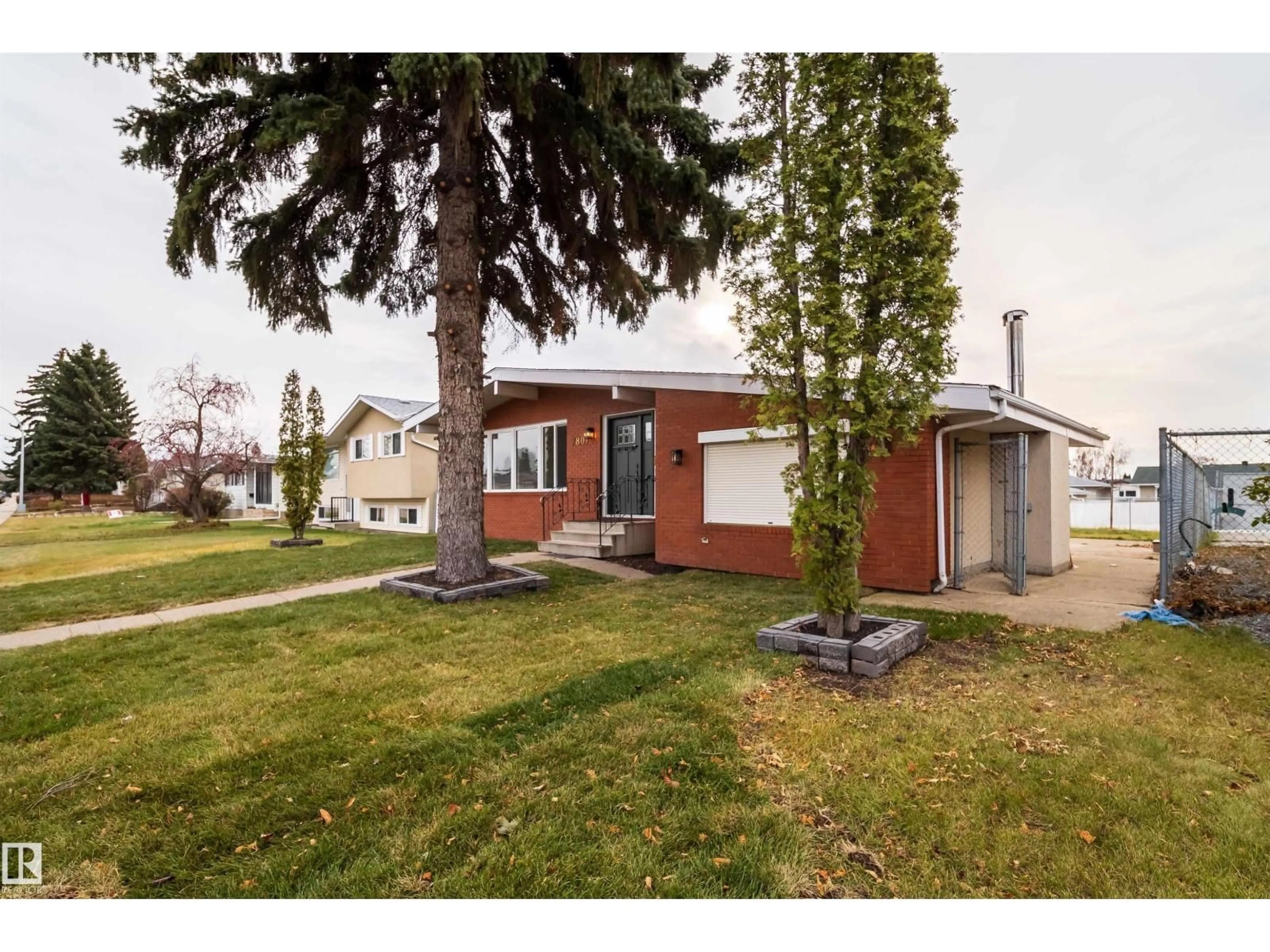 Home with vinyl exterior material, street for 7807 144 AV, Edmonton Alberta T5C2R9