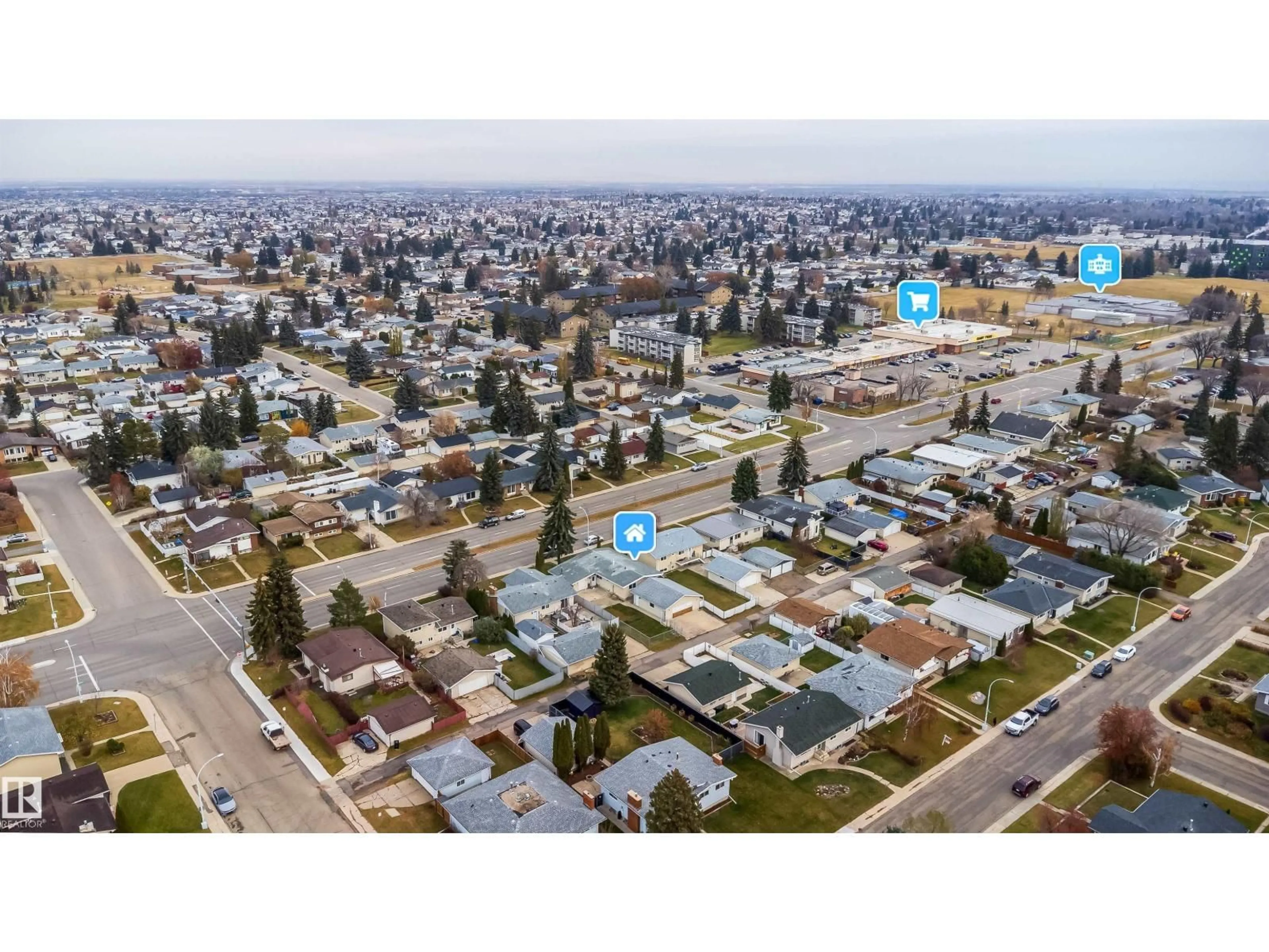 A pic from outside/outdoor area/front of a property/back of a property/a pic from drone, street for 7807 144 AV, Edmonton Alberta T5C2R9