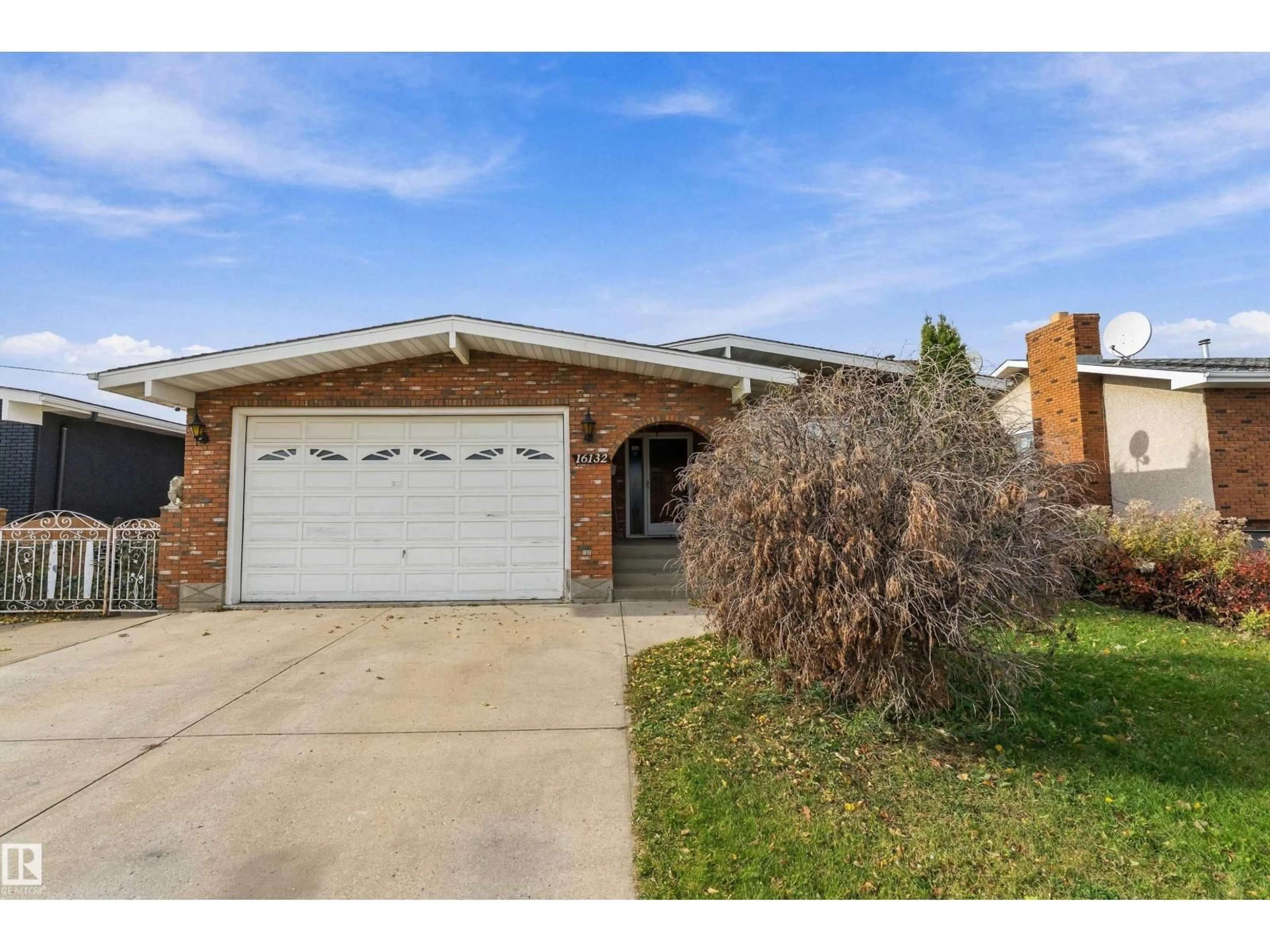 Home with brick exterior material, street for NW - 16132 98 ST, Edmonton Alberta T5X4Y7