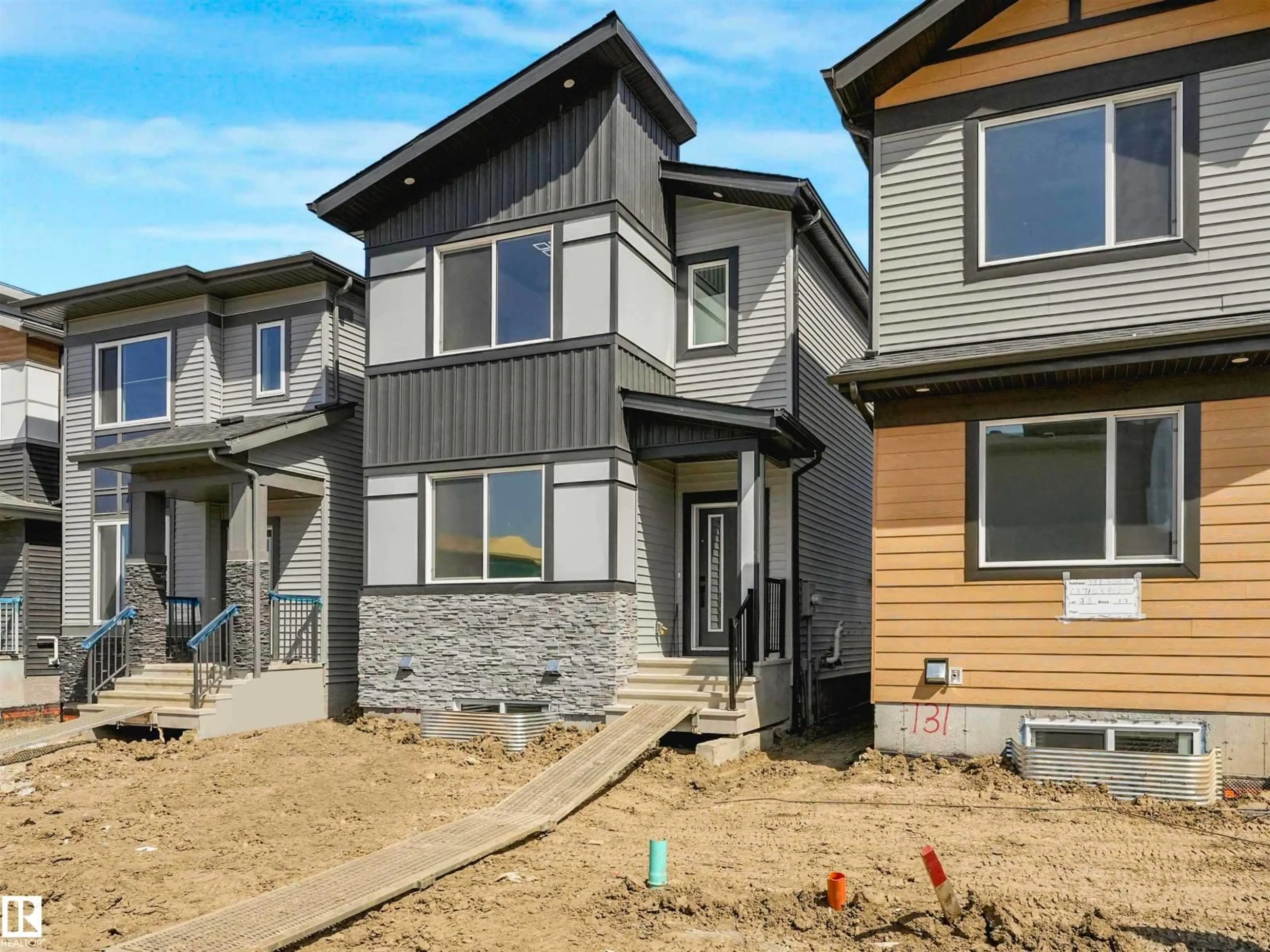 Home with vinyl exterior material, street for 735 30 STREET, Edmonton Alberta T6X3M3