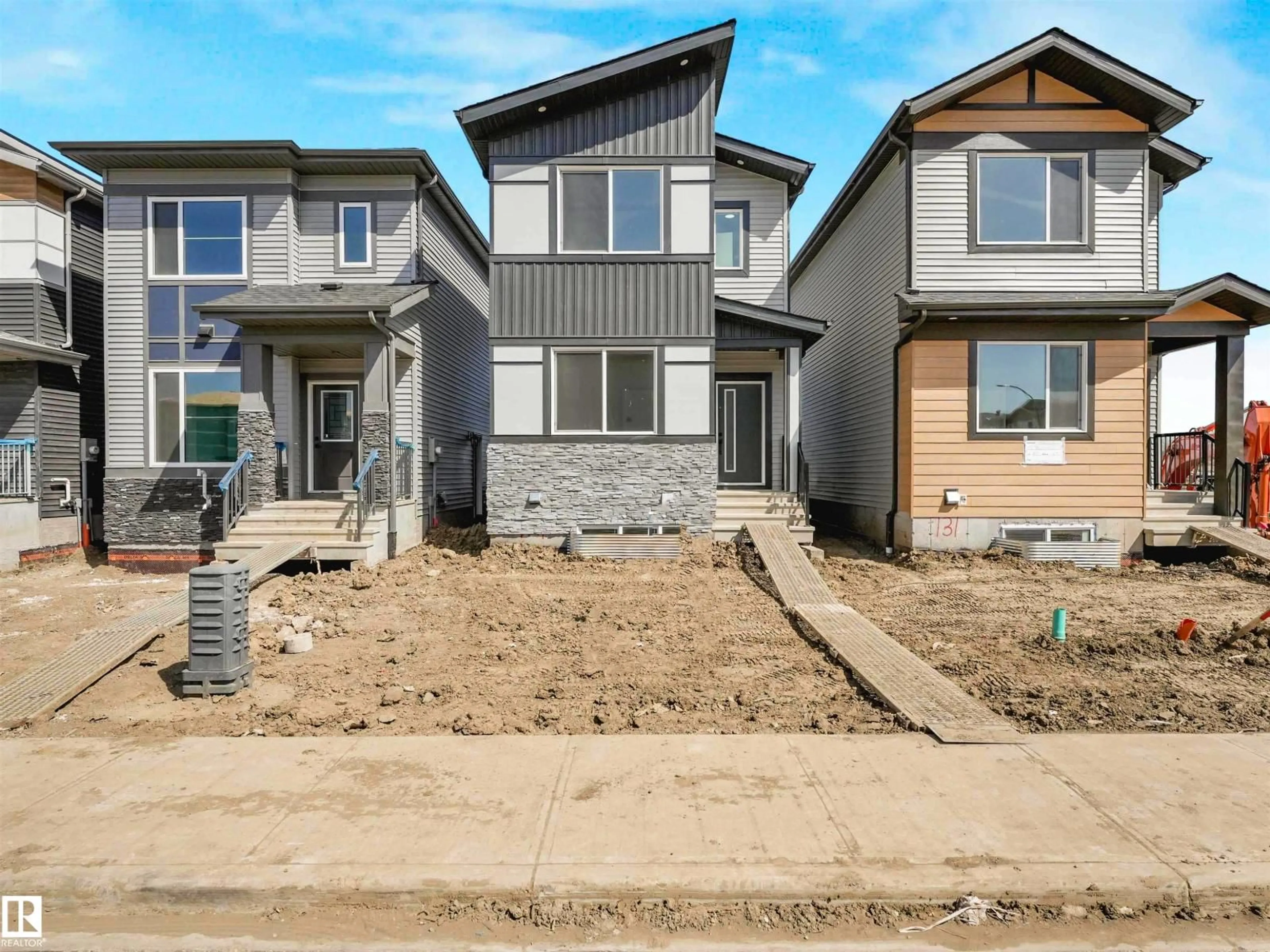 Home with vinyl exterior material, street for 735 30 STREET, Edmonton Alberta T6X3M3