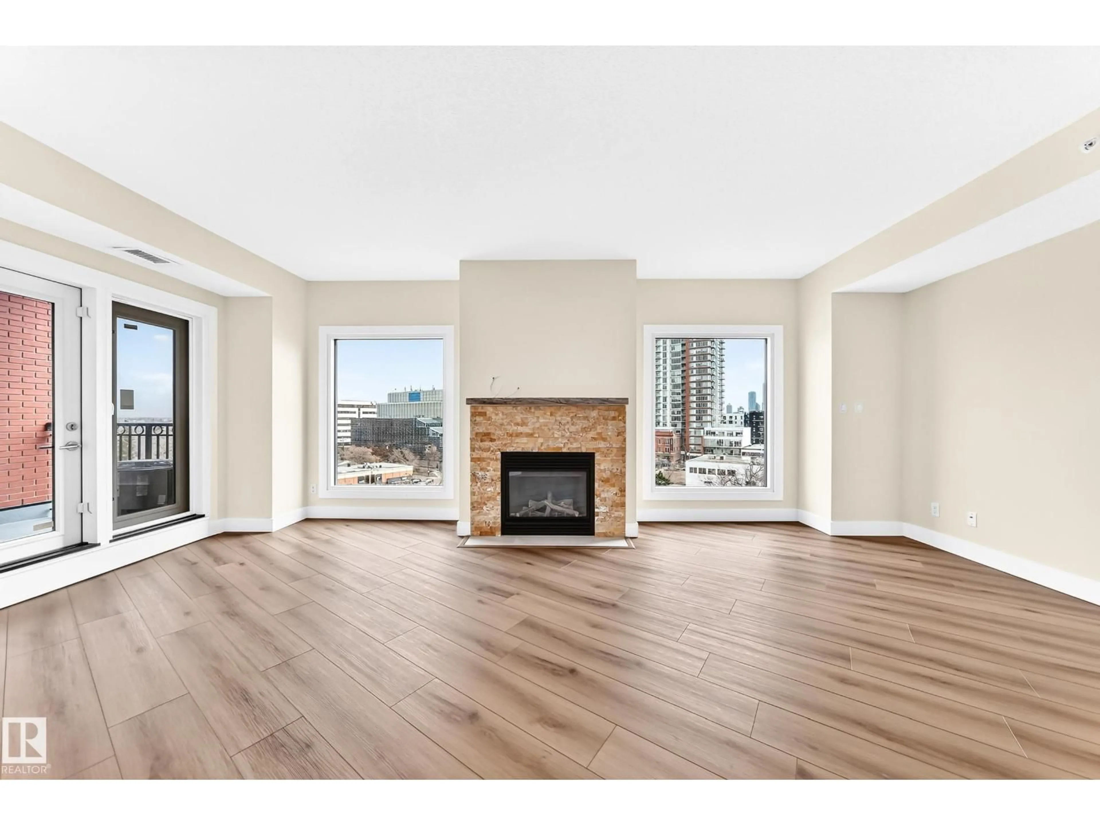 Living room with furniture, wood/laminate floor for 707 - 10108 125 ST, Edmonton Alberta T5N4B6
