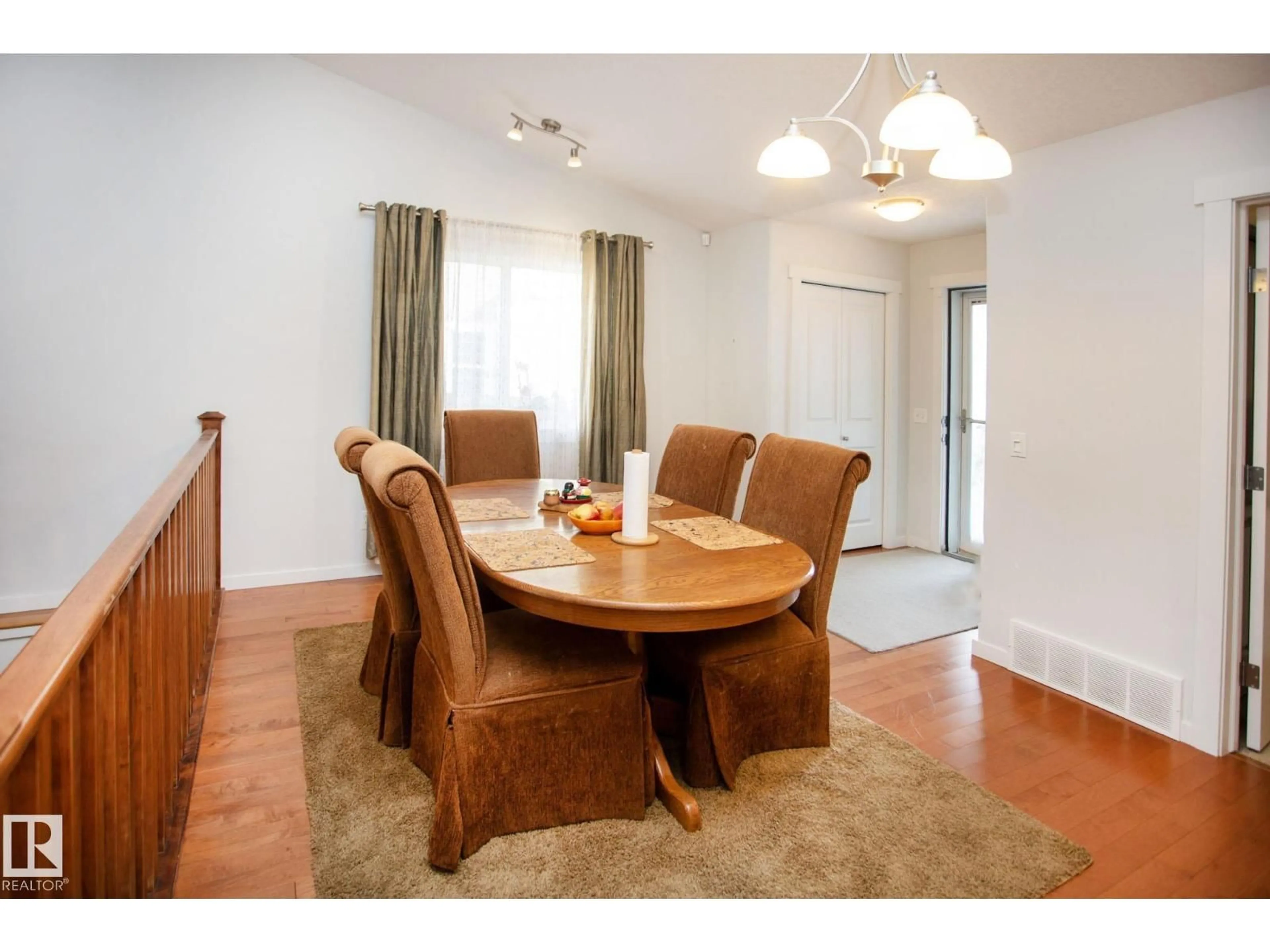 Dining room, wood/laminate floor for 14 NEVIS CL, St. Albert Alberta T8N0R5