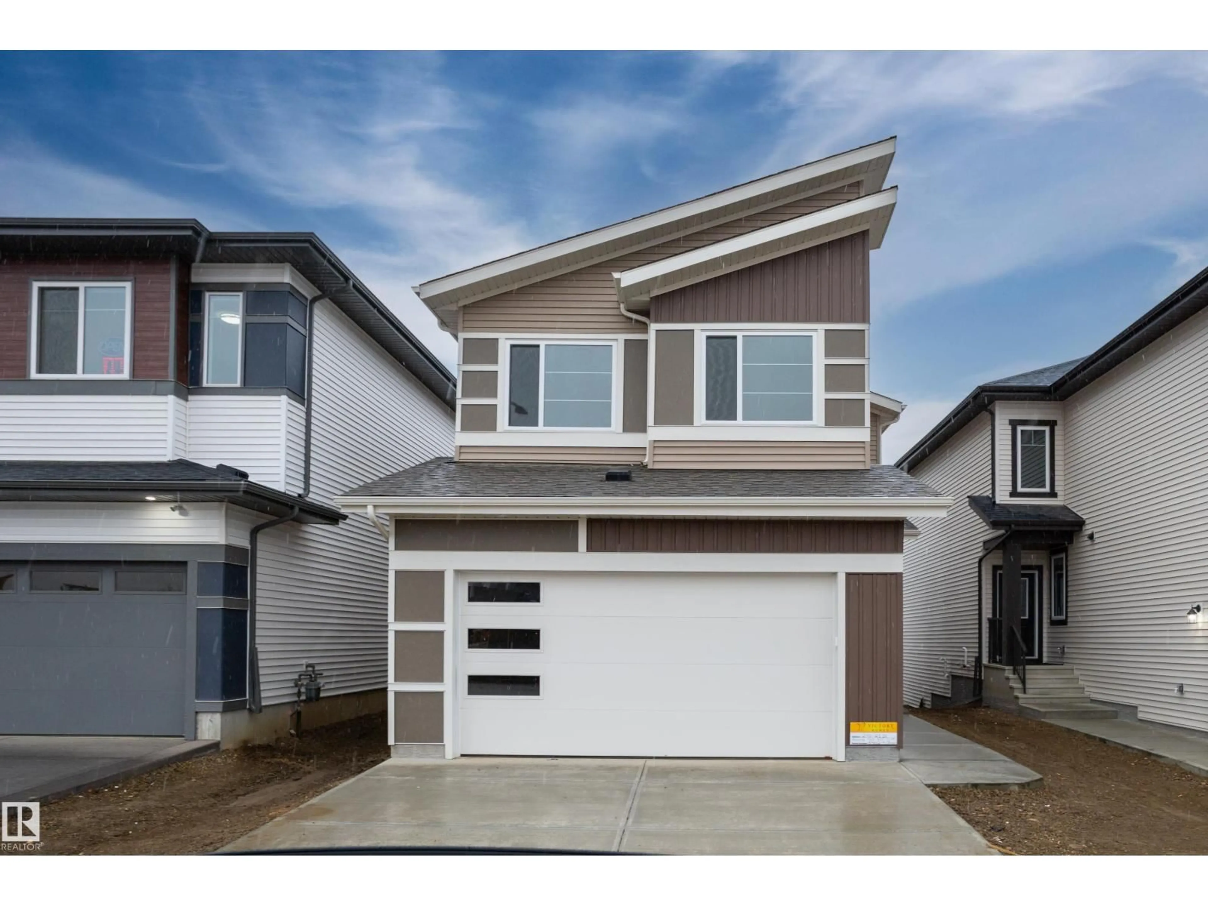Home with vinyl exterior material, street for SW - 240 21 ST, Edmonton Alberta T6X3R3