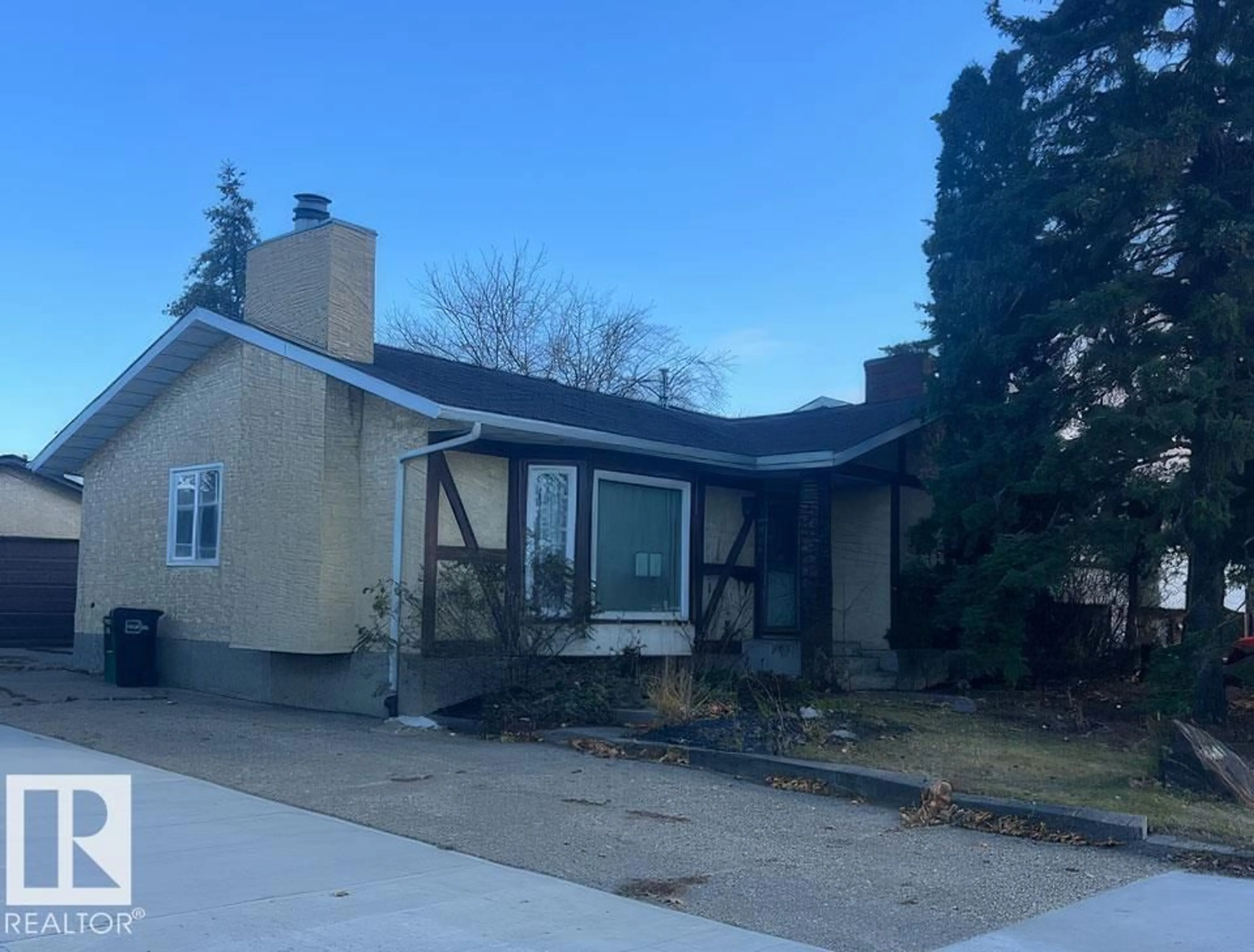 Home with vinyl exterior material, street for 16411 106 ST, Edmonton Alberta T5X1W4