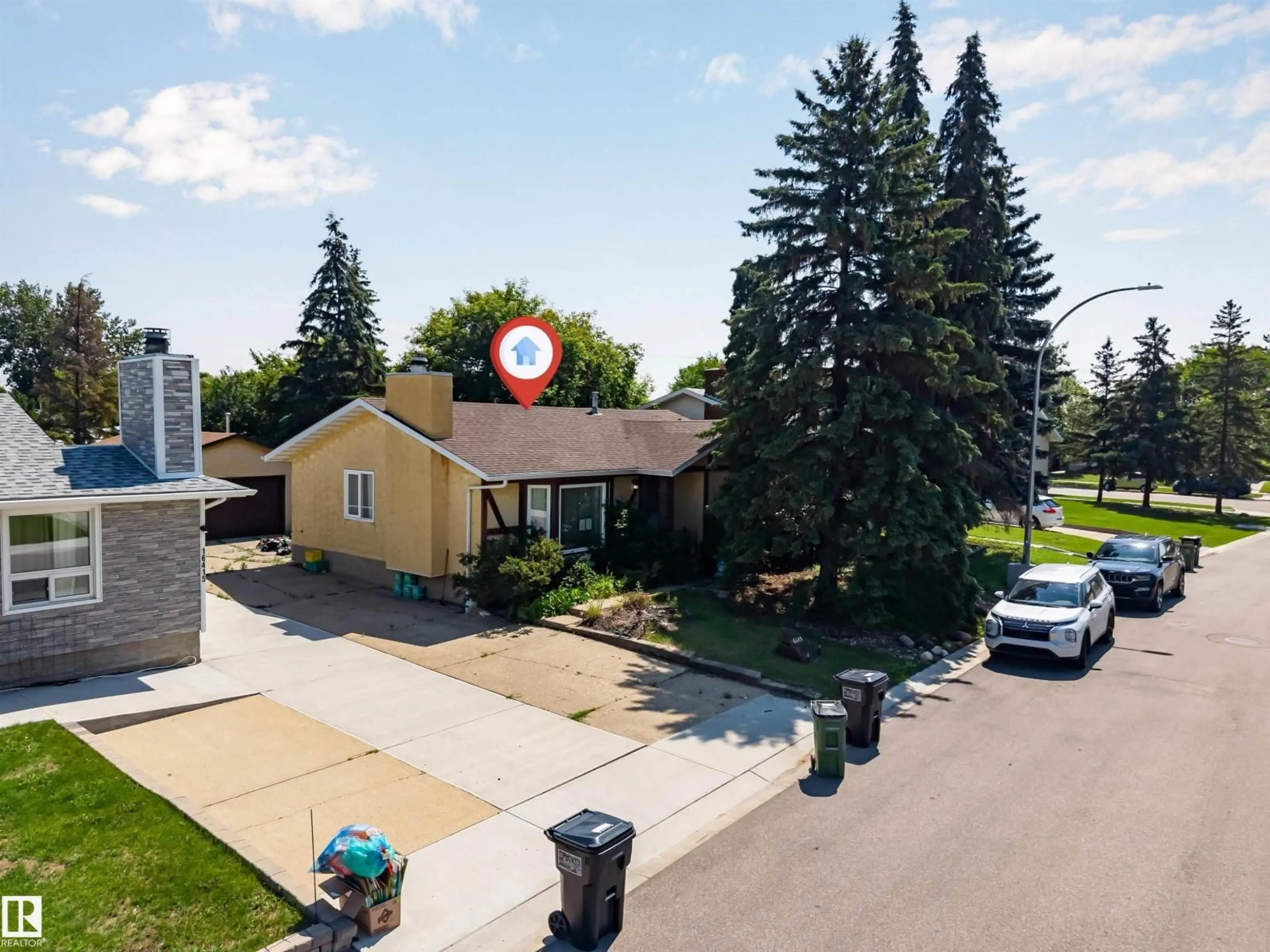 A pic from outside/outdoor area/front of a property/back of a property/a pic from drone, street for 16411 106 ST, Edmonton Alberta T5X1W4