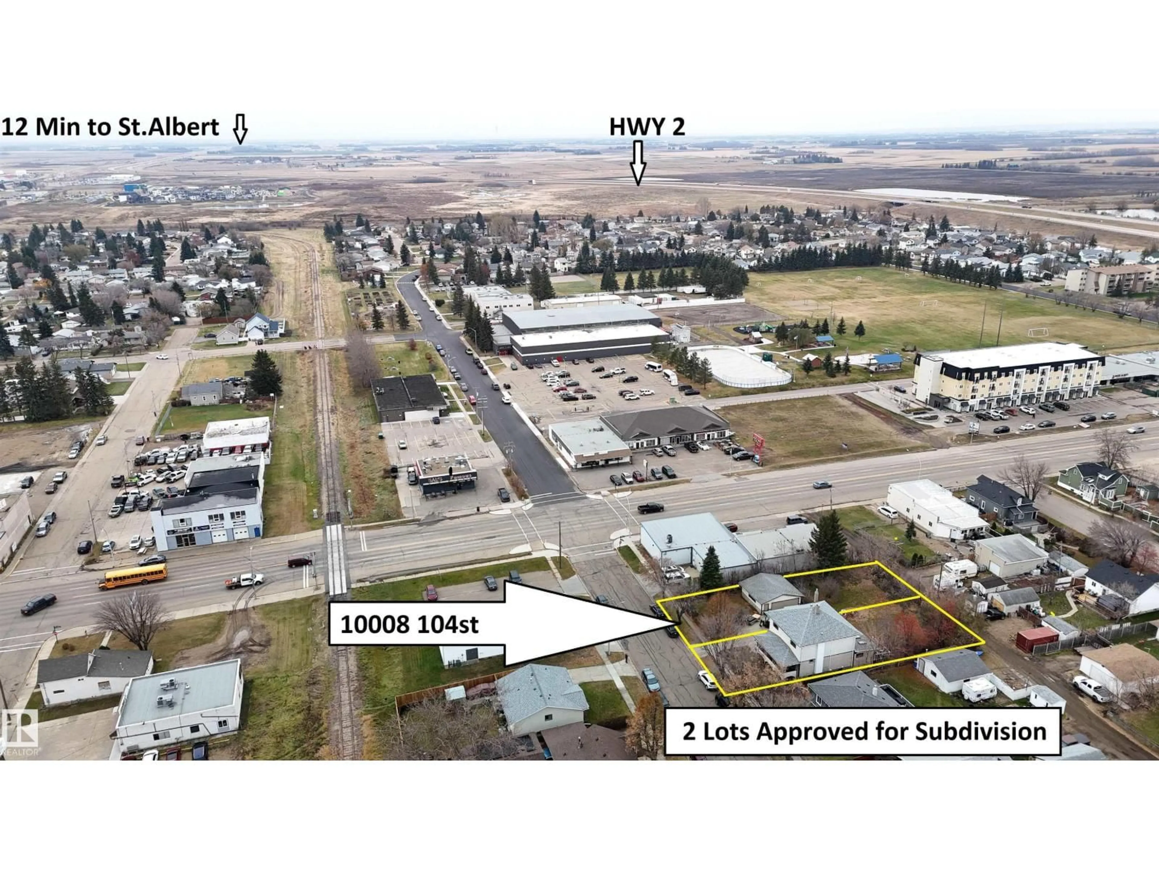 A pic from outside/outdoor area/front of a property/back of a property/a pic from drone, building for 10008 104 ST, Morinville Alberta T8R1A5