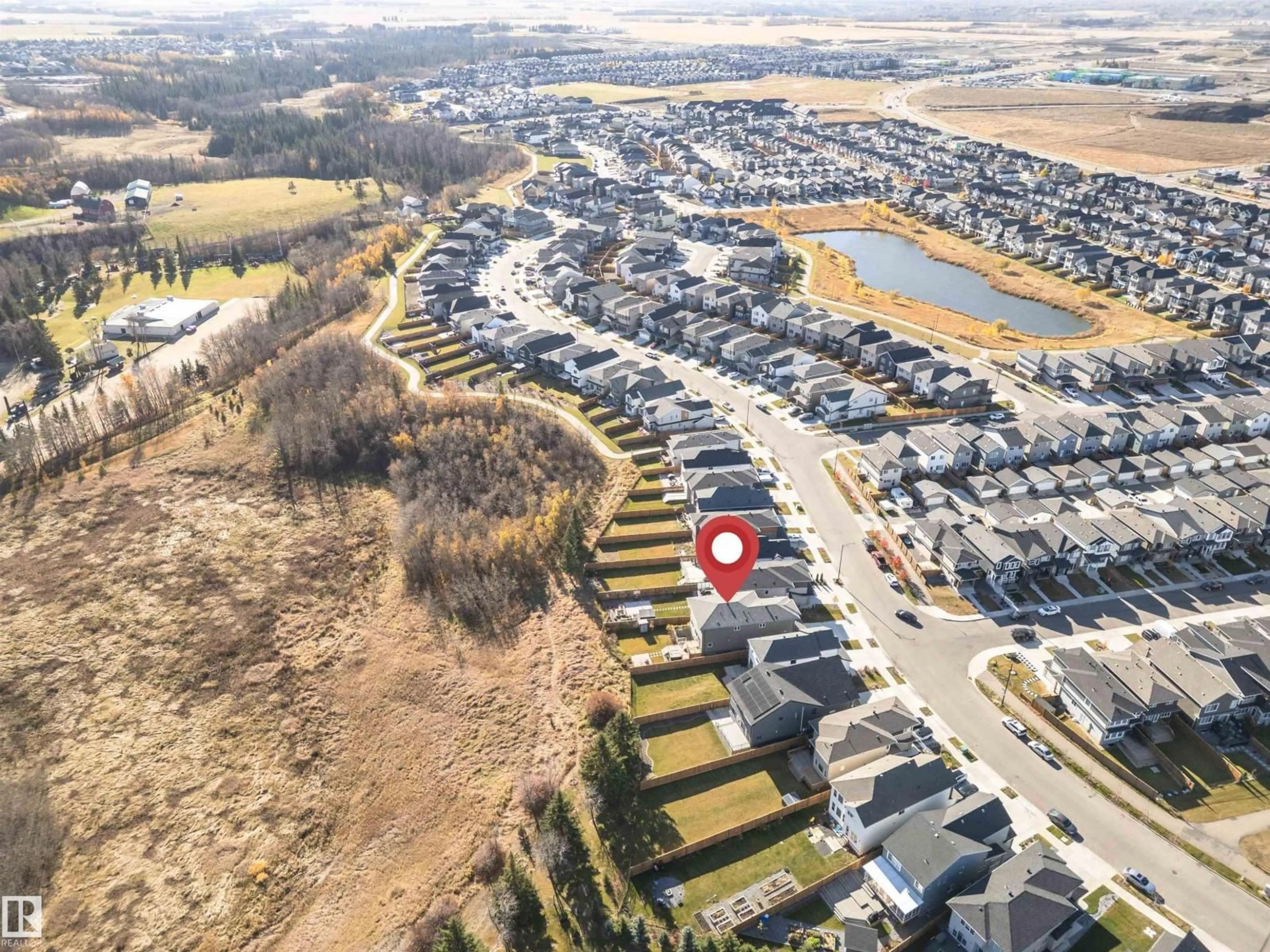 A pic from outside/outdoor area/front of a property/back of a property/a pic from drone, street for 229 GLENRIDDING RAVINE RD, Edmonton Alberta T6W5C2