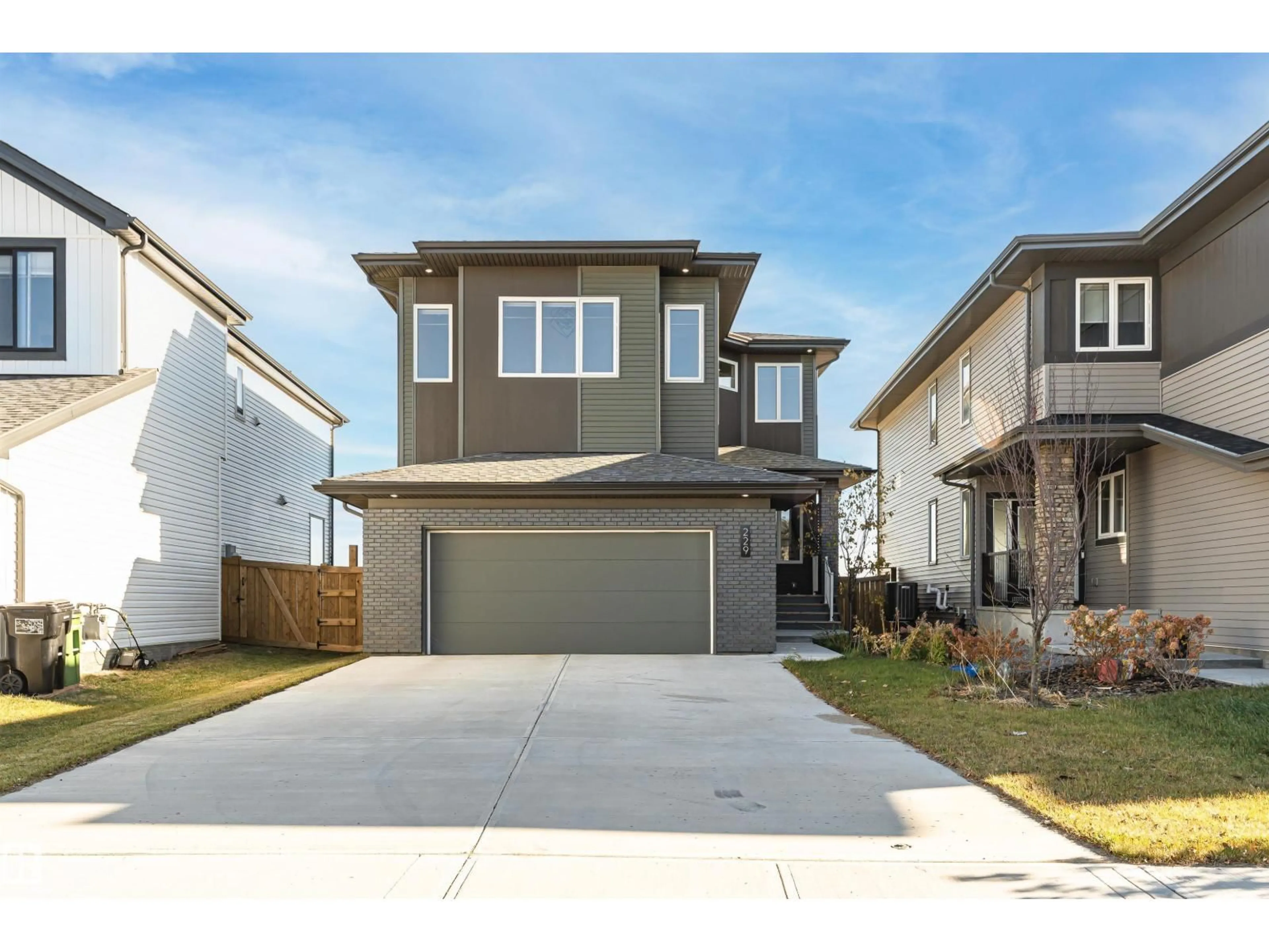 Home with vinyl exterior material, street for 229 GLENRIDDING RAVINE RD, Edmonton Alberta T6W5C2