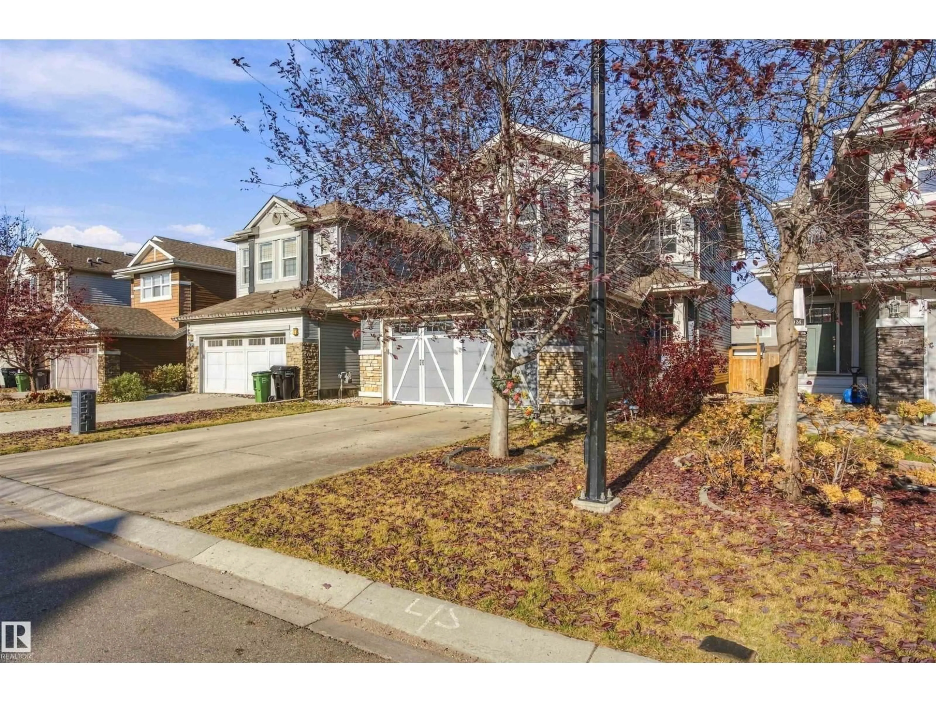 Home with vinyl exterior material, street for 1926 CHAPMAN ROAD, Edmonton Alberta T6W0Y7
