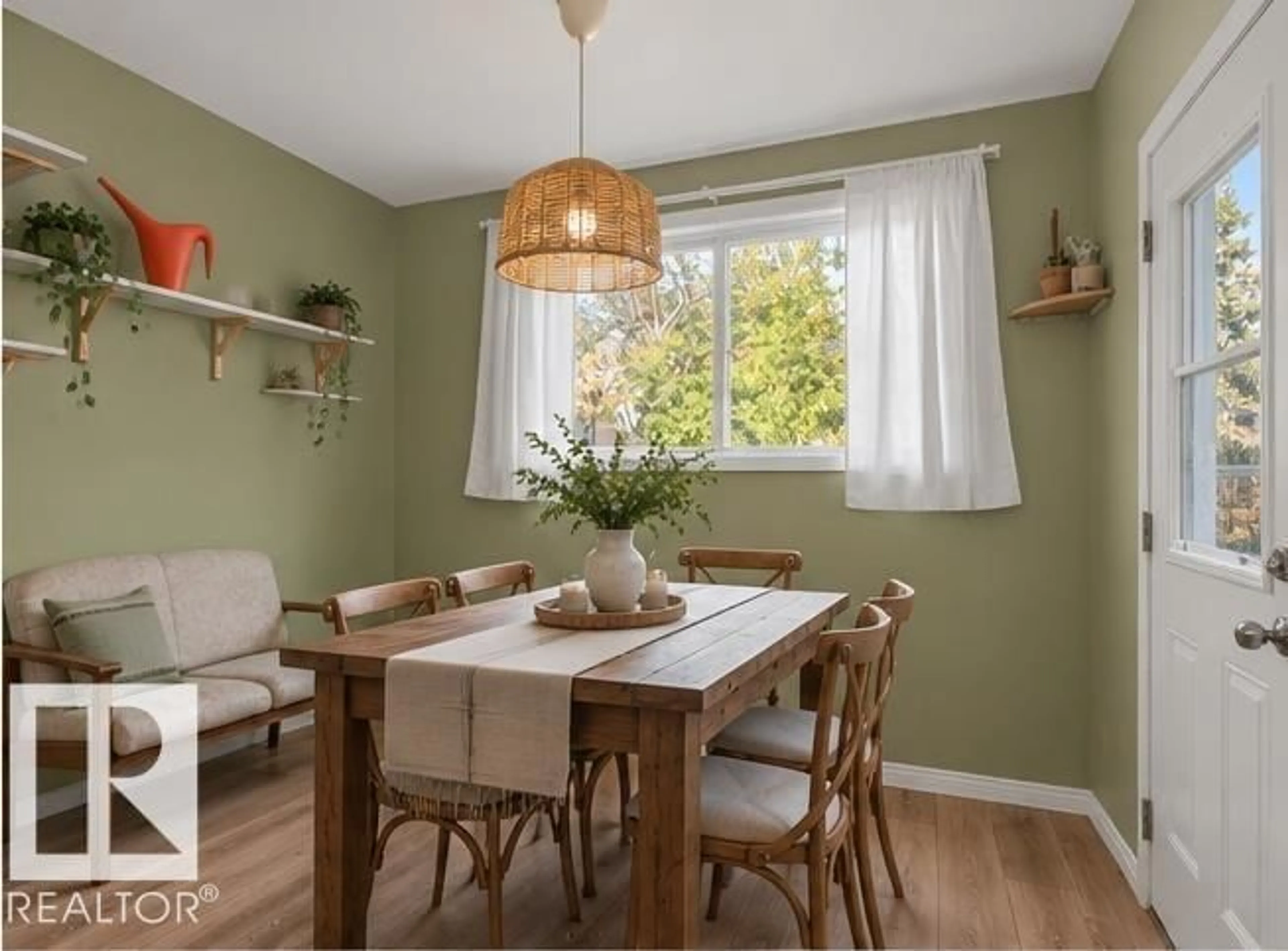 Dining room, wood/laminate floor for 9626 85 AV, Edmonton Alberta T6C1H4