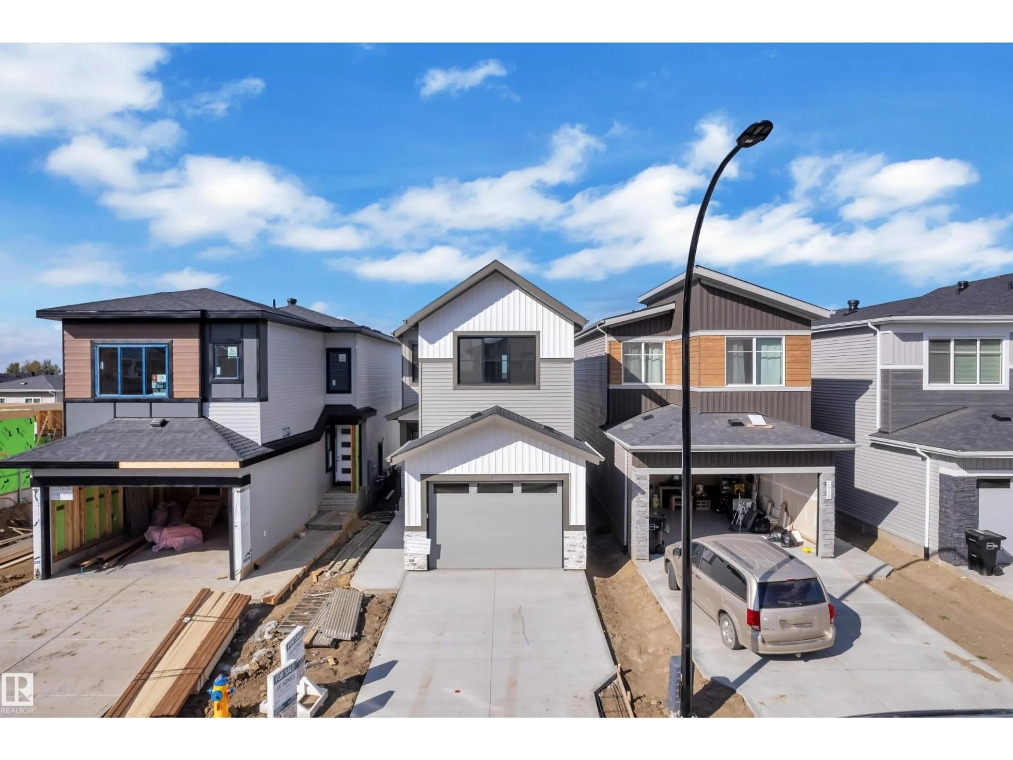 A pic from outside/outdoor area/front of a property/back of a property/a pic from drone, street for 2972 8 AVENUE SW, Edmonton Alberta T6X3M3