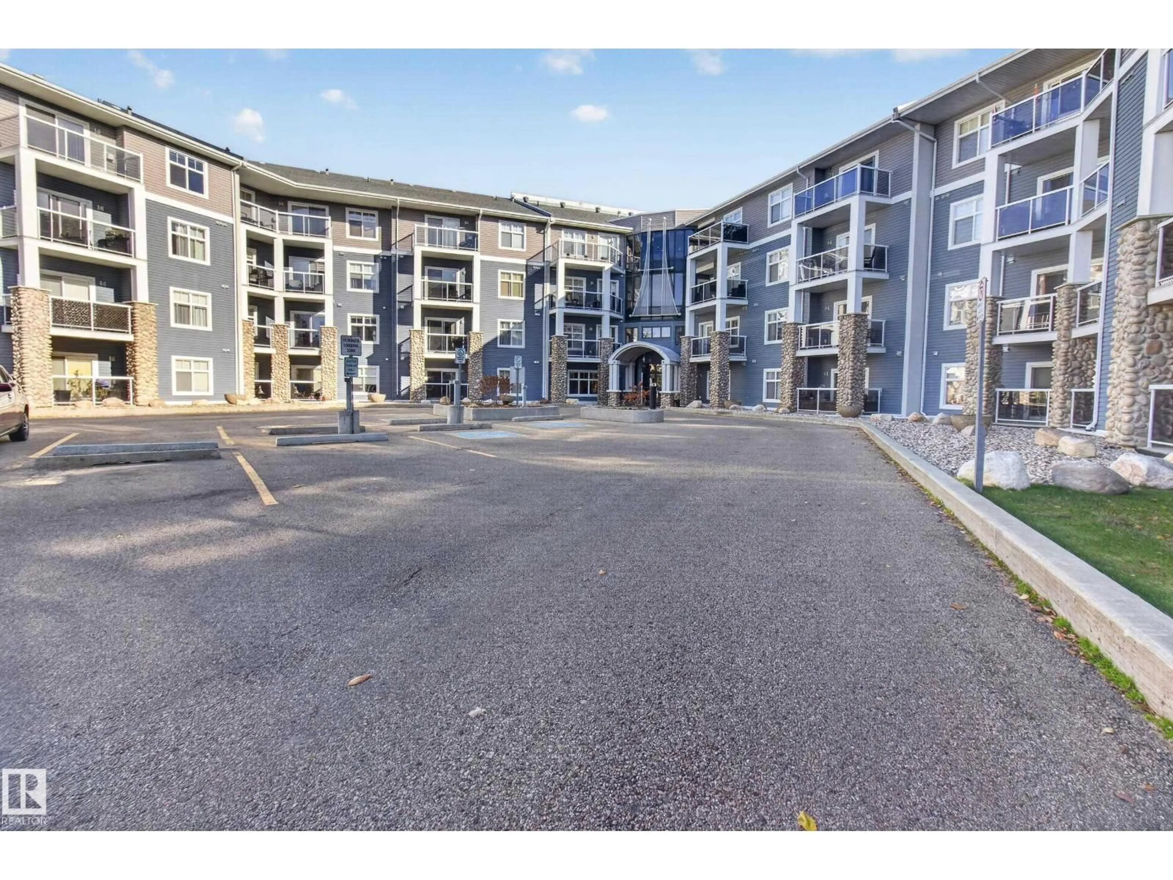 A pic from outside/outdoor area/front of a property/back of a property/a pic from drone, street for #201 - 16035 132 ST, Edmonton Alberta T6V0B4