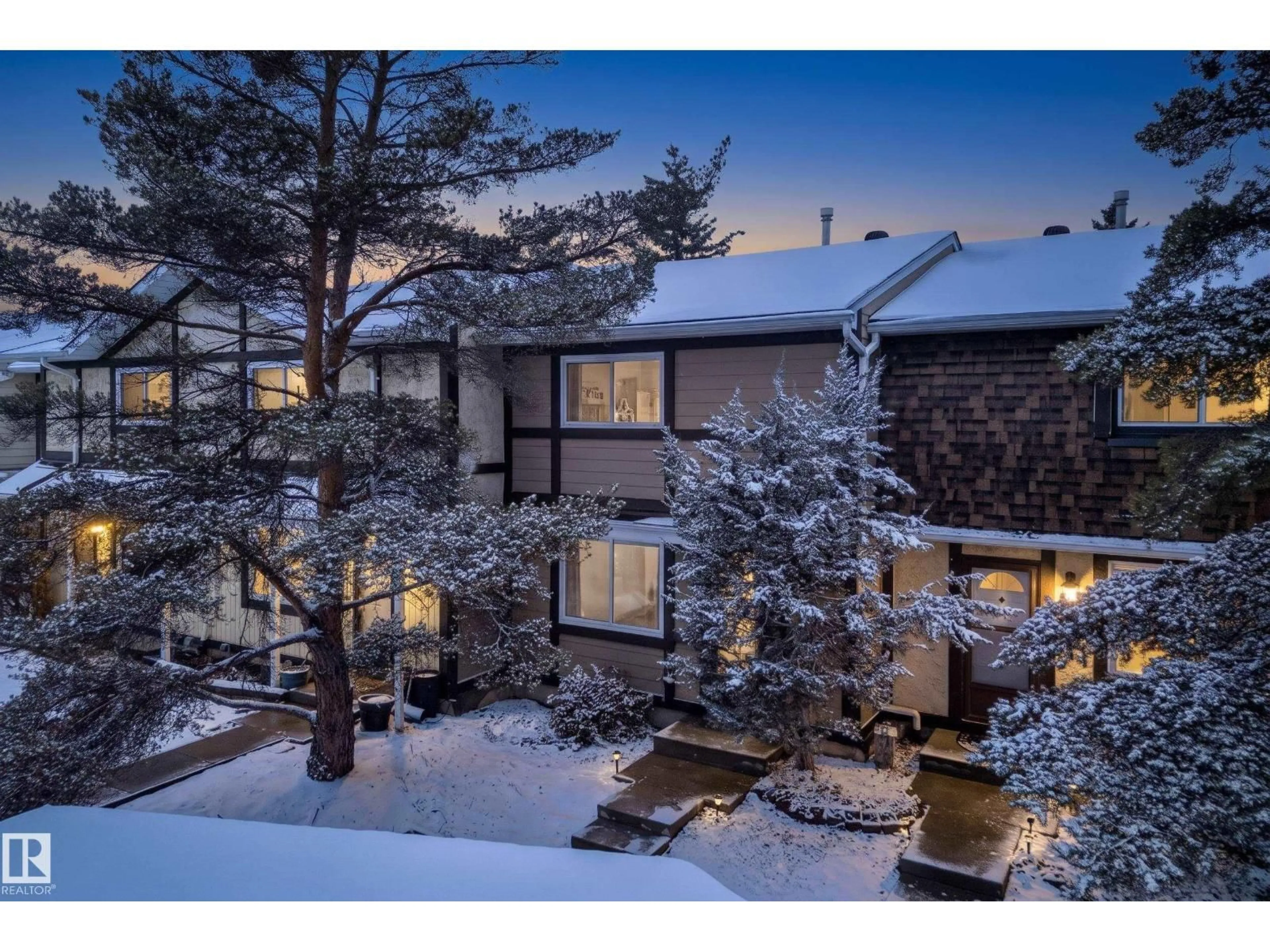 A pic from outside/outdoor area/front of a property/back of a property/a pic from drone, mountain view for 181 TUDOR LN, Edmonton Alberta T6J3T5