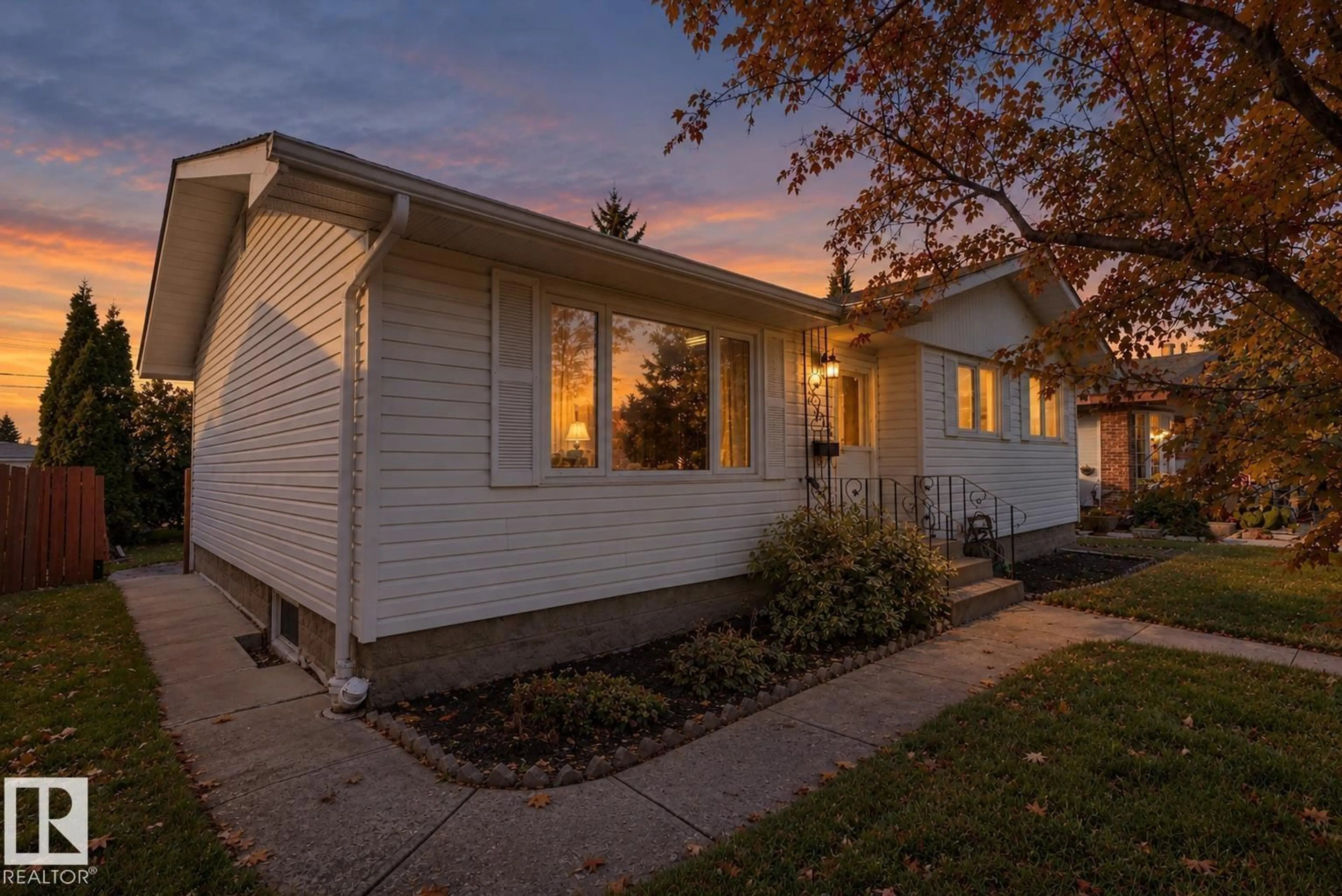 Home with vinyl exterior material, street for NW - 13304 73 ST, Edmonton Alberta T5C0T8