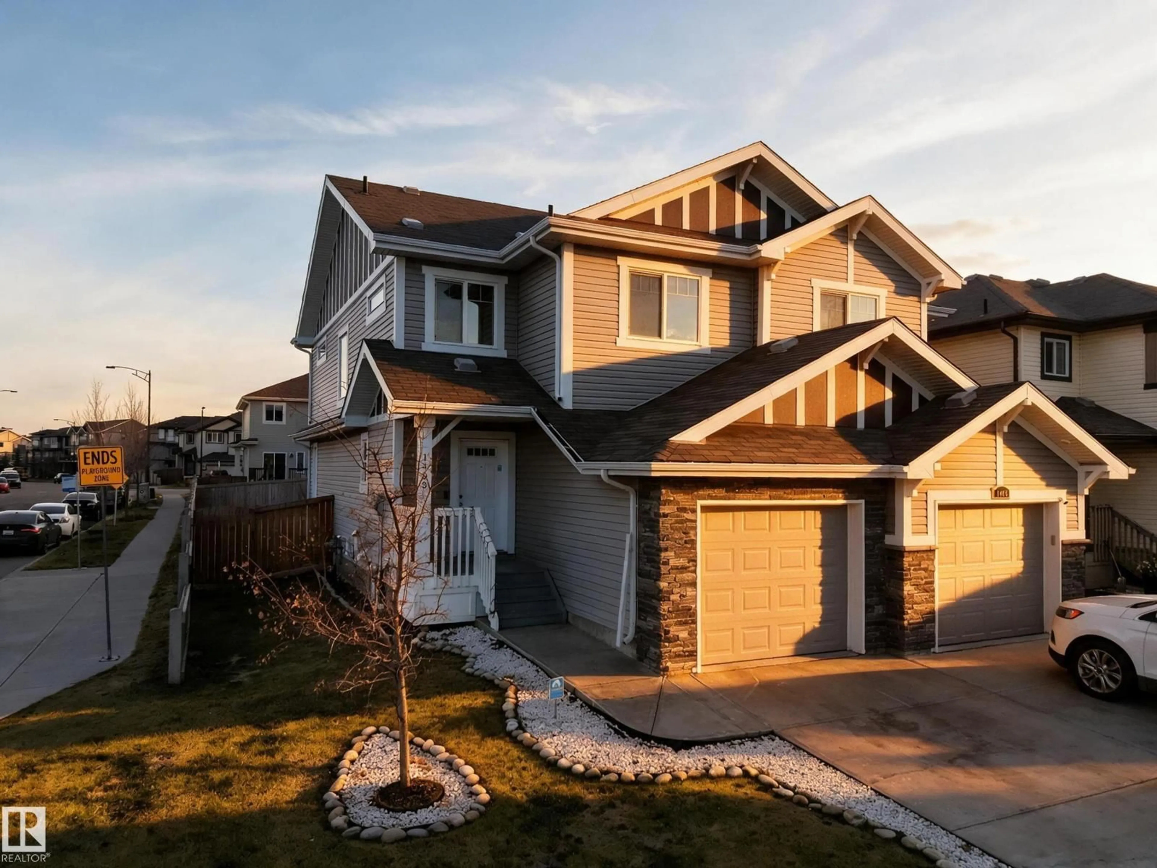 Home with vinyl exterior material, street for NW - 1403 26 AVE, Edmonton Alberta T6T0W1