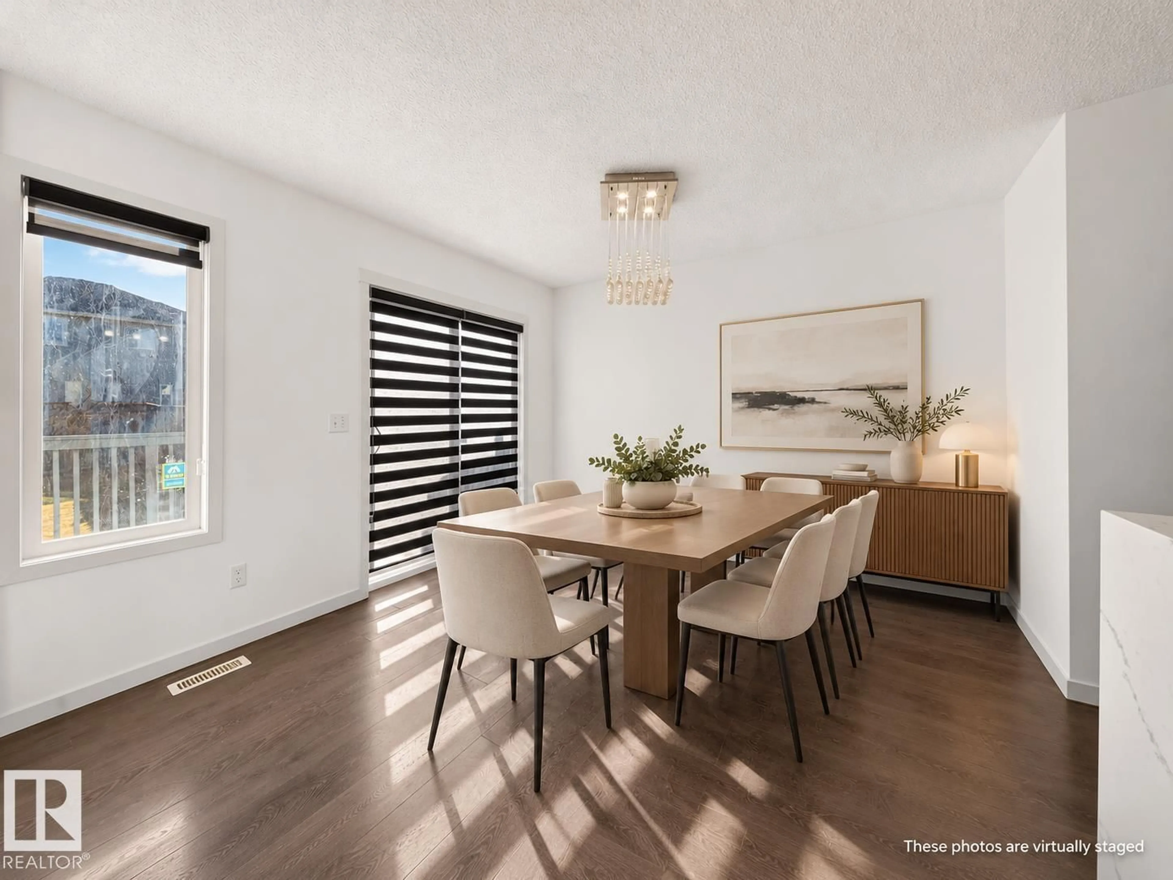Dining room, wood/laminate floor for NW - 1403 26 AVE, Edmonton Alberta T6T0W1